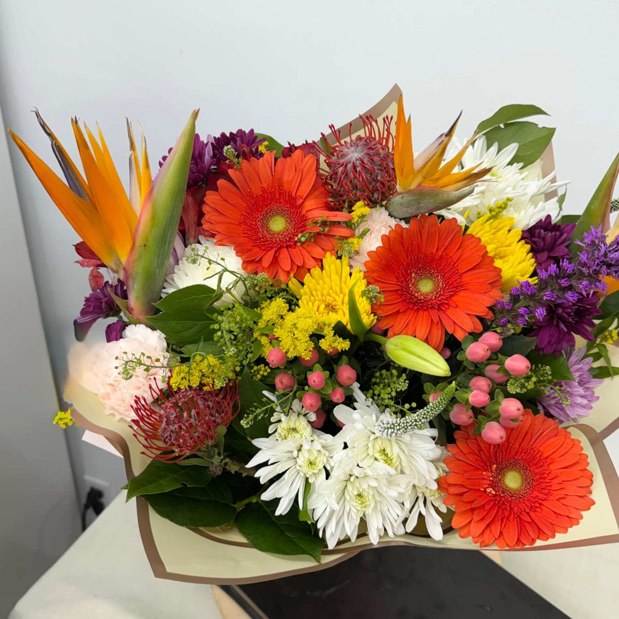 Our Tropical sunset Bouquet is What better choice of flowers than this