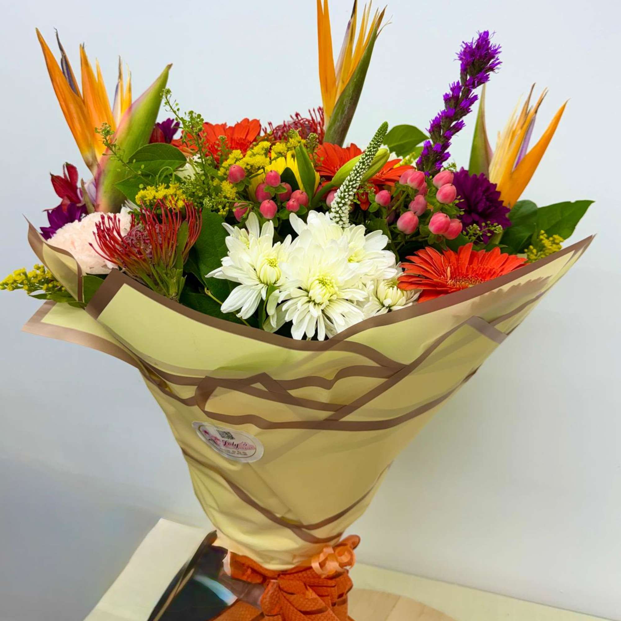 Our Tropical sunset Bouquet is What better choice of flowers than this
