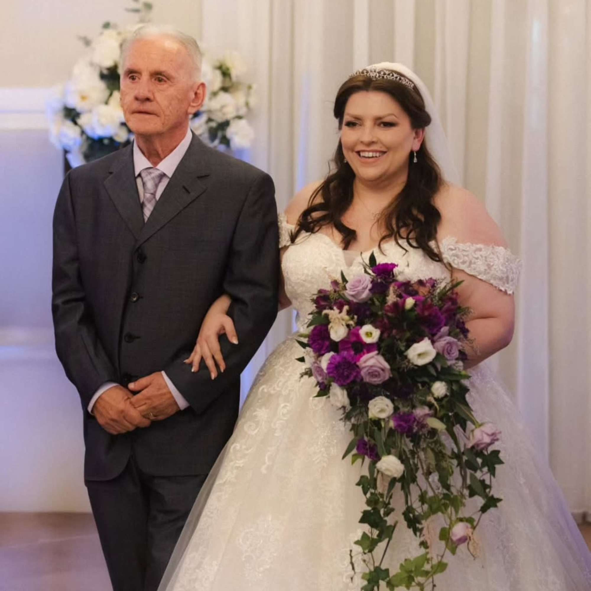 This cascading bridal bouquet is a statement piece designed for elegant weddings