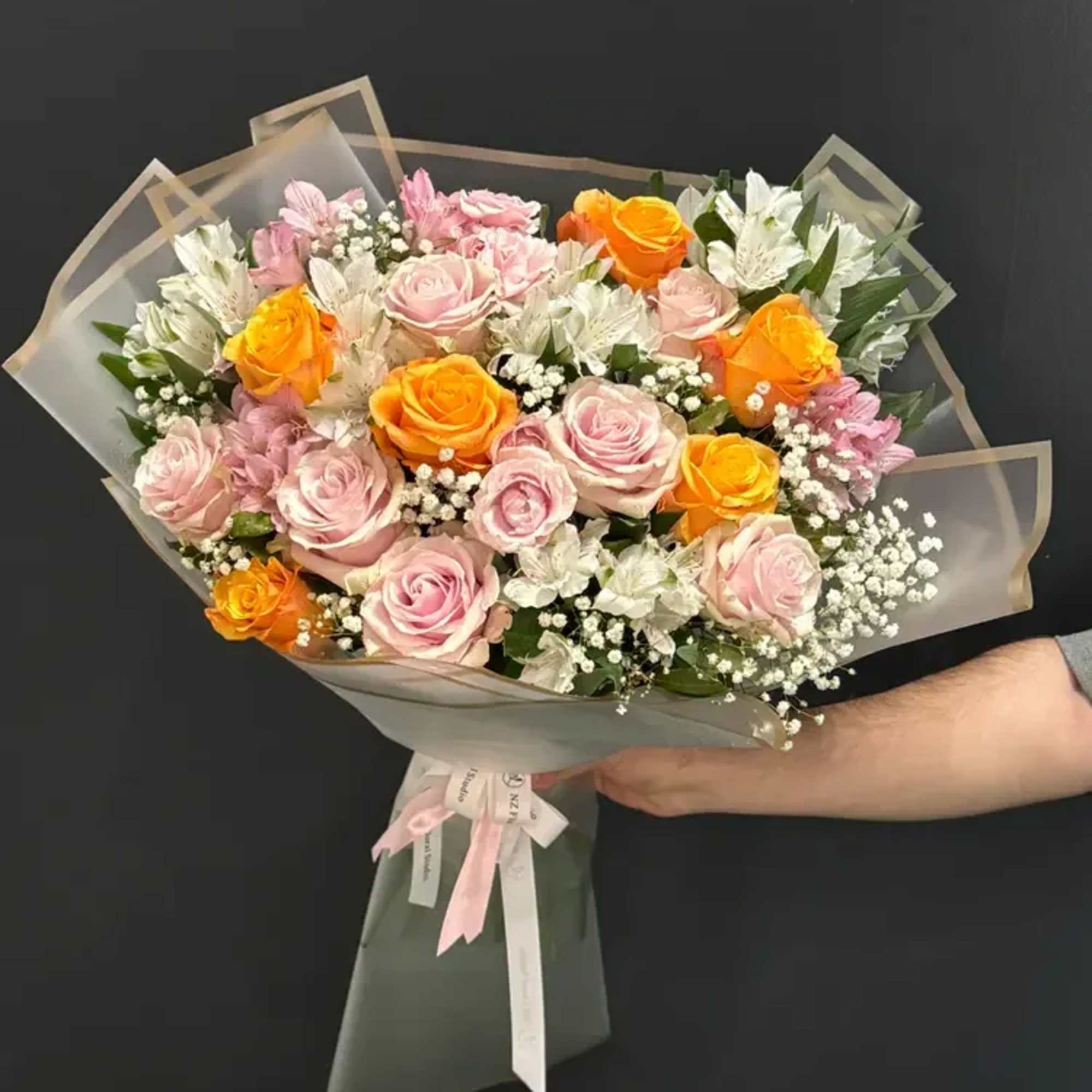 This bouquet is a beautiful harmony of softness and vibrant energy. It