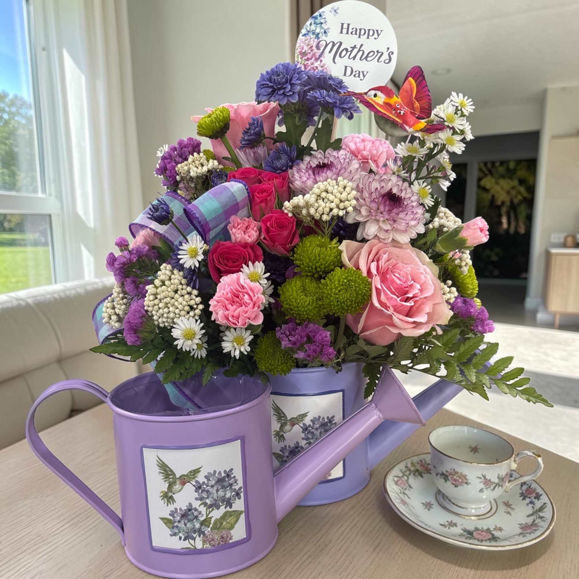 Celebrate Mom with our exclusive Fluttering Garden Watering Can from Aspen Tower