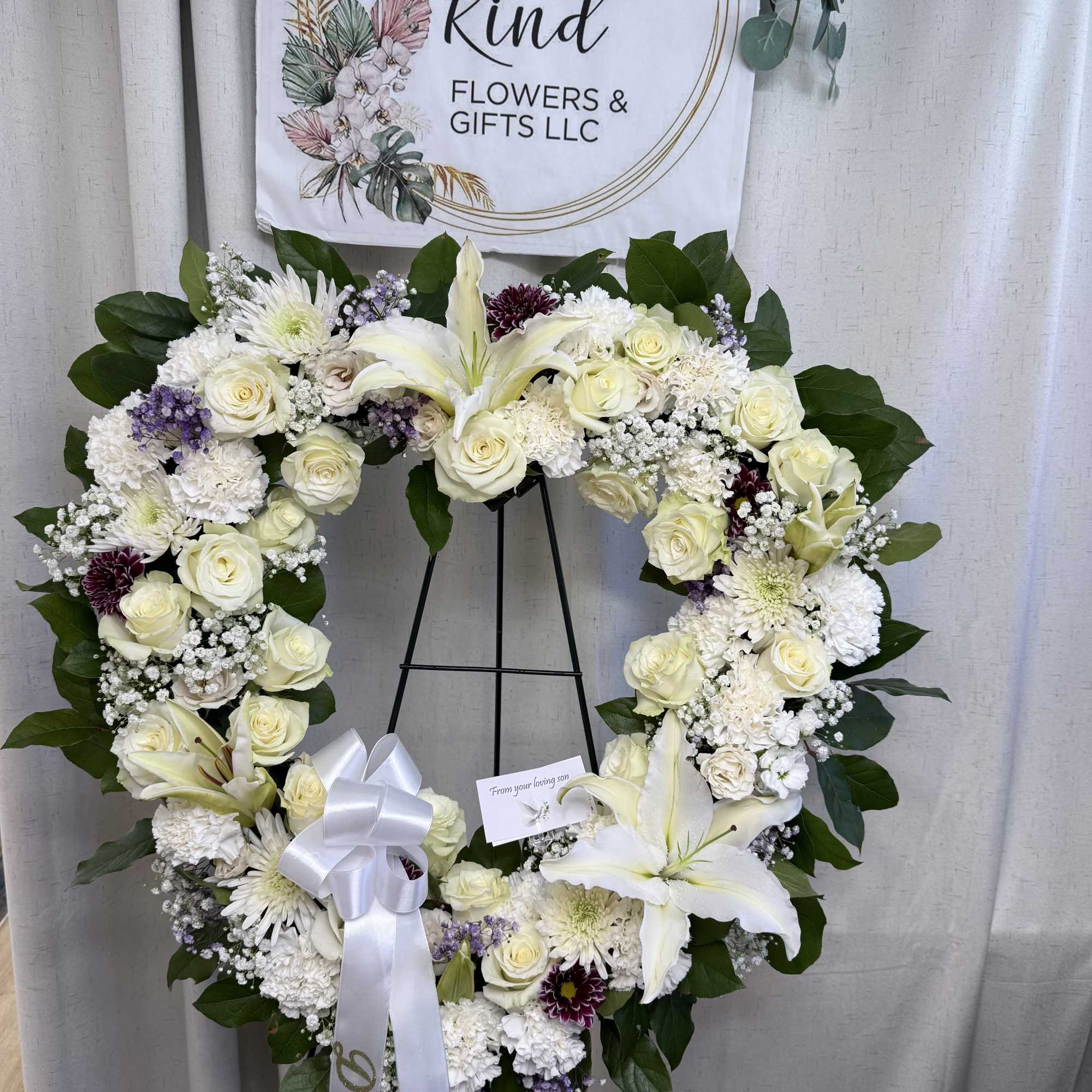 open heart arrangement, beautifully crafted with flowers in your chosen colors, symbolizing