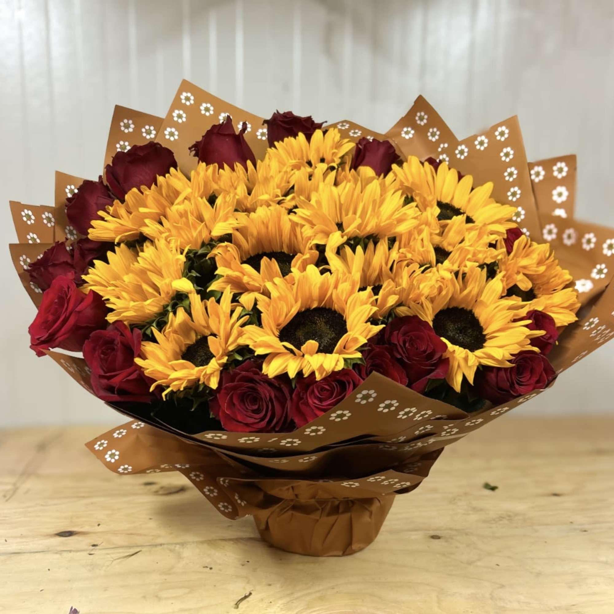 A bold and radiant arrangement that captures the warmth of golden hour.