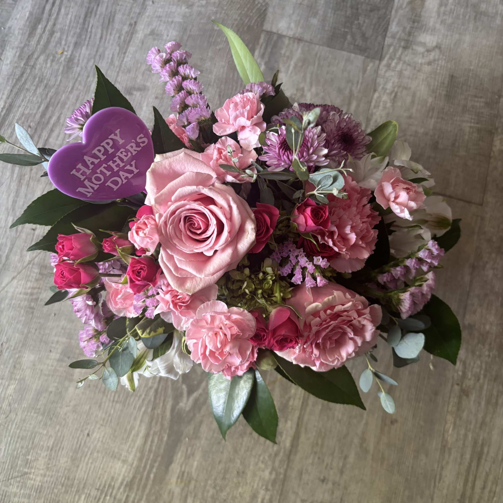 Pretty Pink Purse is a stylish Mother&rsquo;s Day flower arrangement designed in