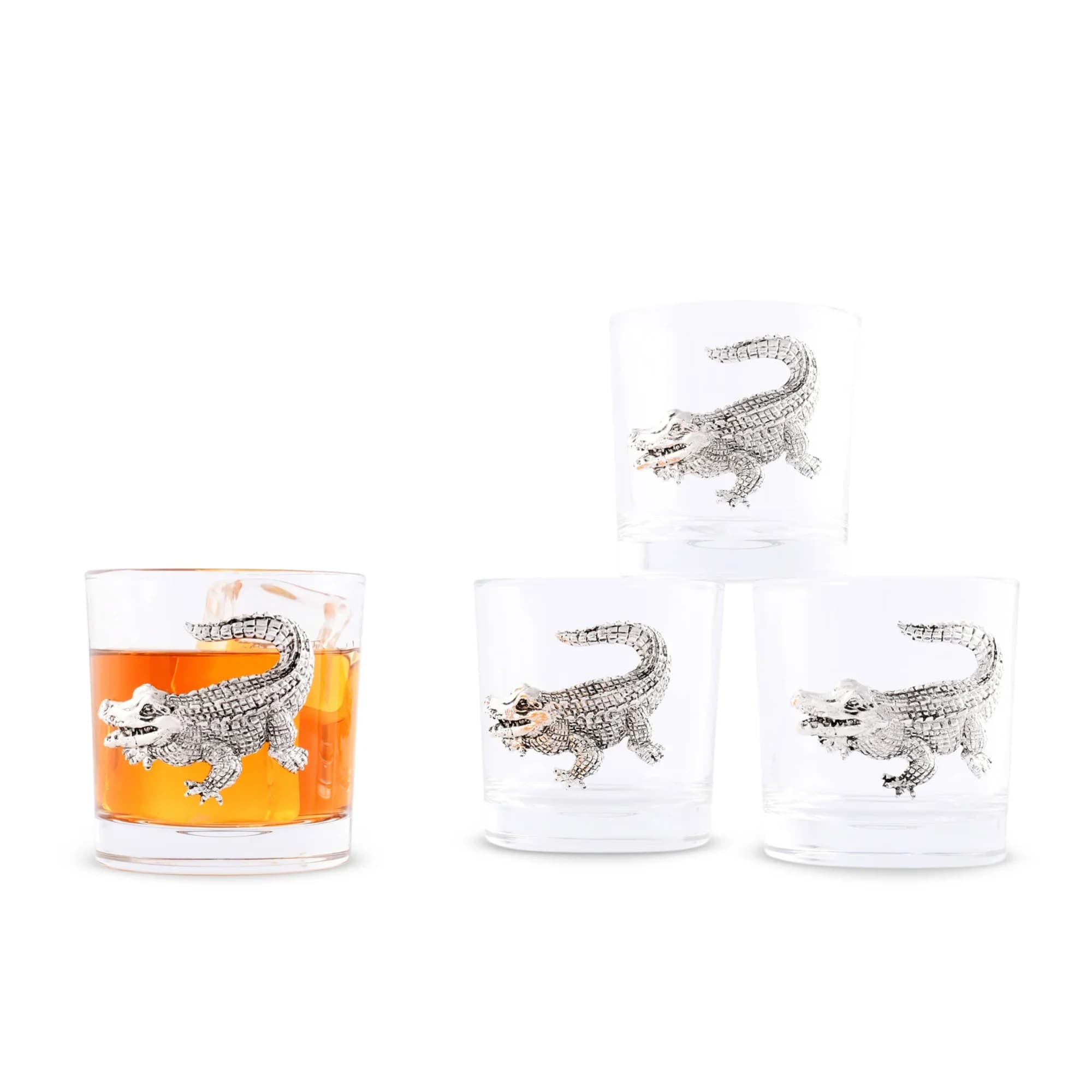 Set of clear glasses with silver crocodile designs