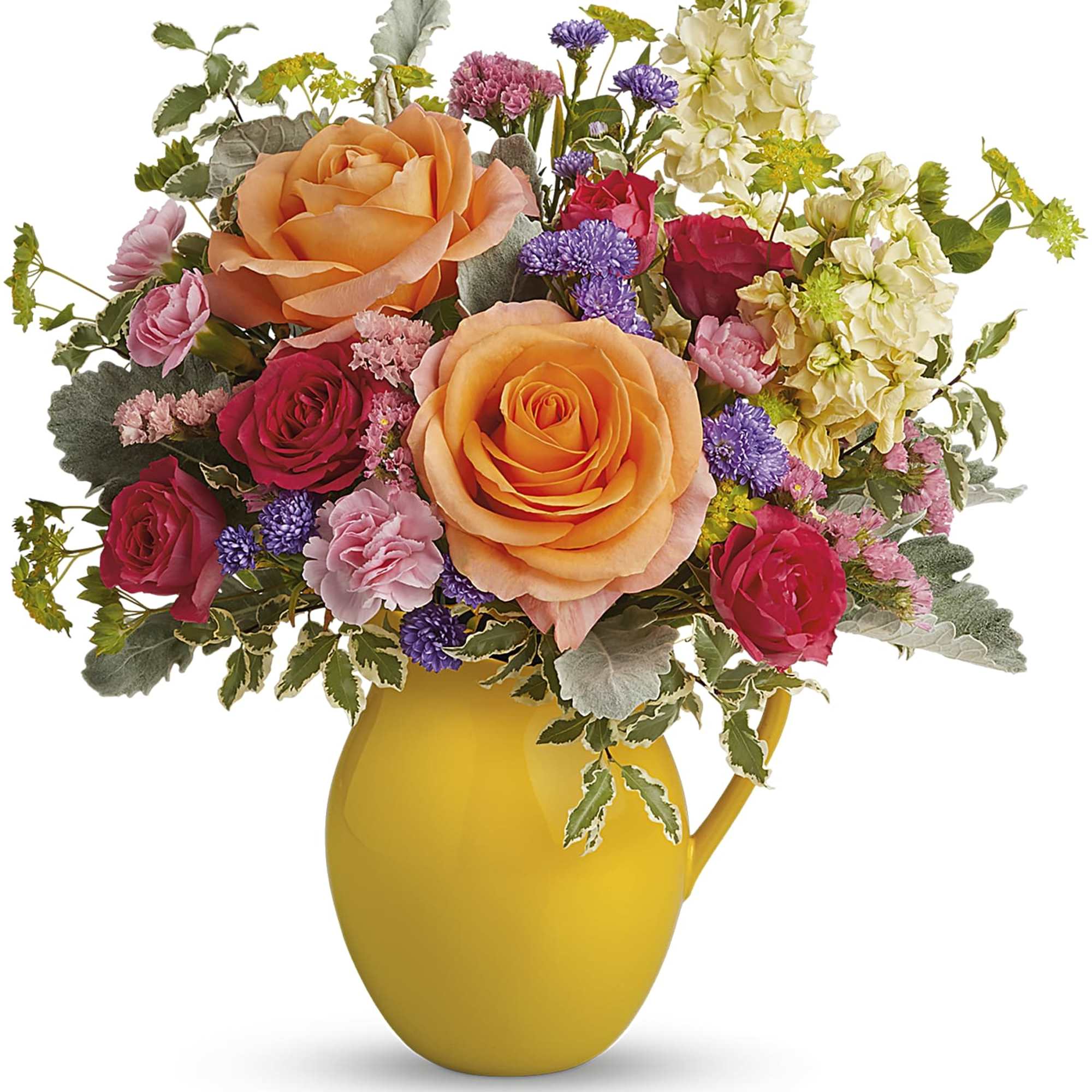Mixed bouquet of roses and small purple flowers in a yellow pitcher vase