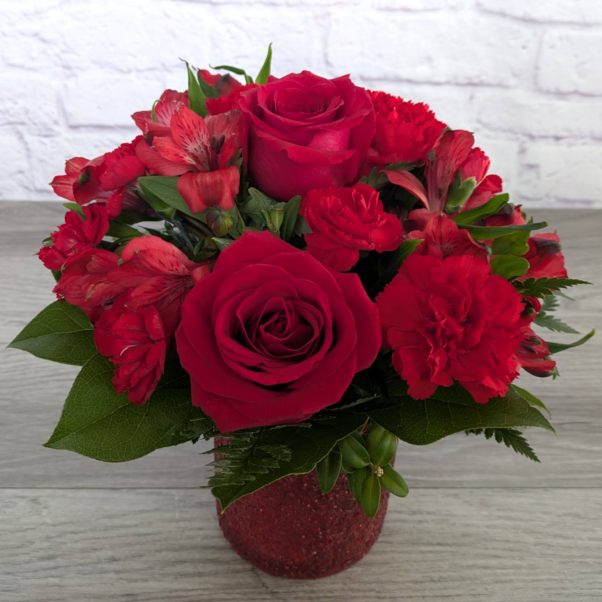 Ruby Slipper is A Ladybug Floral exclusive bouquet. This bouquet includes roses