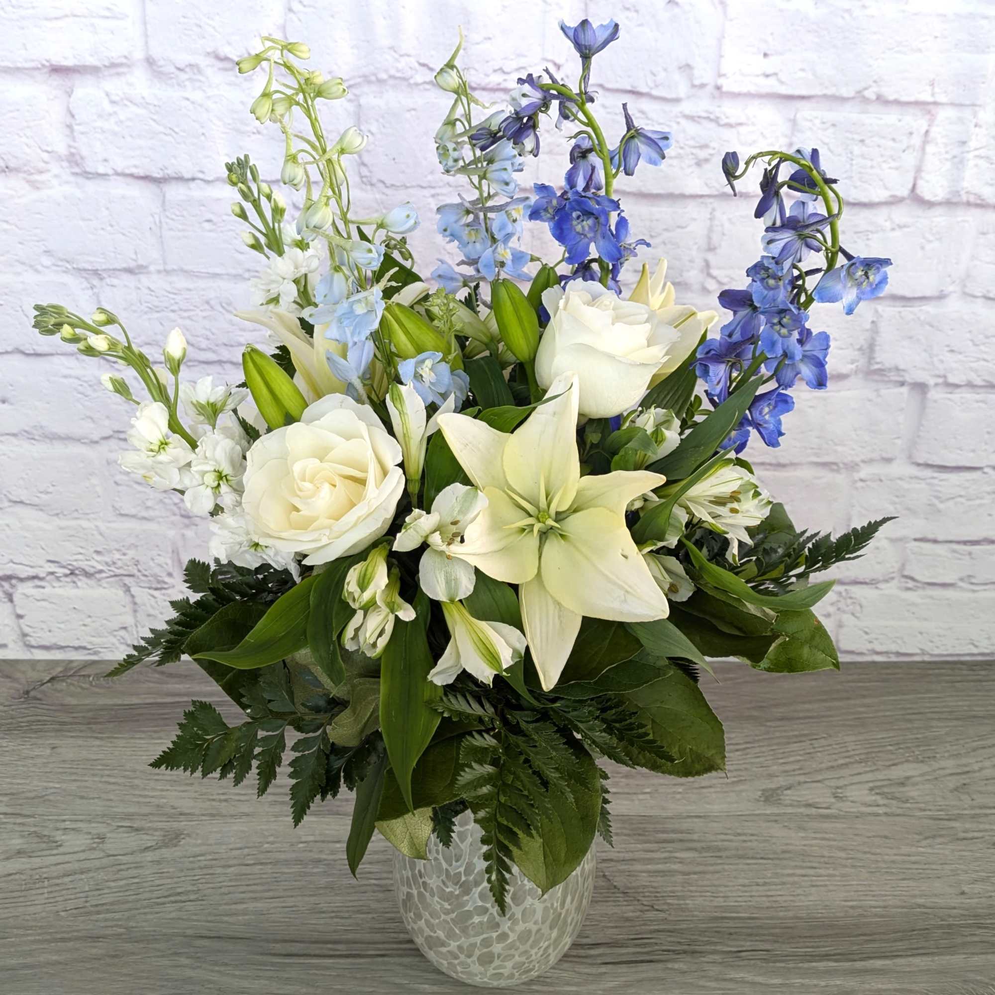 Iridescent Clouds is A Ladybug Floral exclusive bouquet. This bouquet includes asiatic