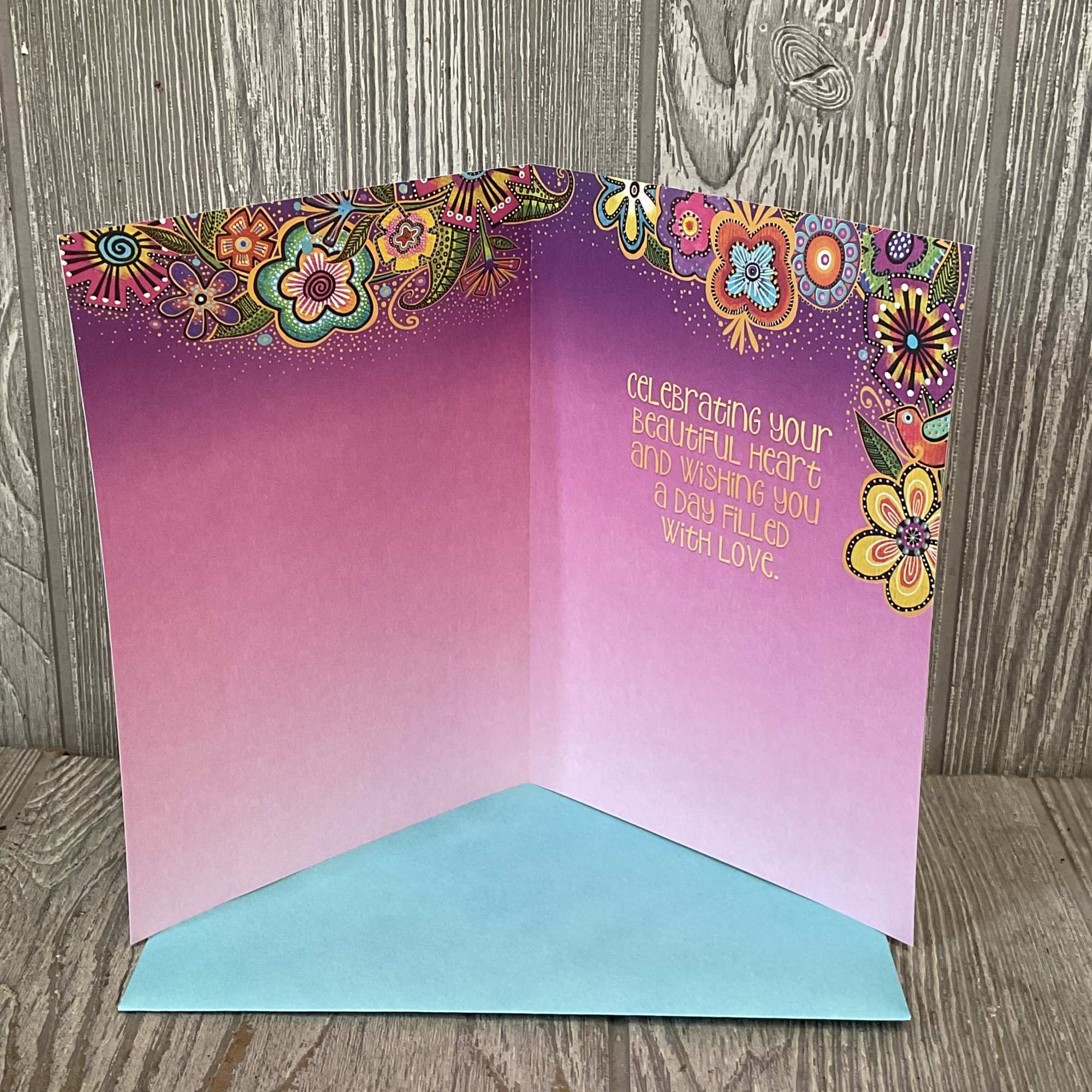 Full size greeting card. 
Front: Happy Mother&rsquo;s Day
Inside: Celebrating your beautiful heart