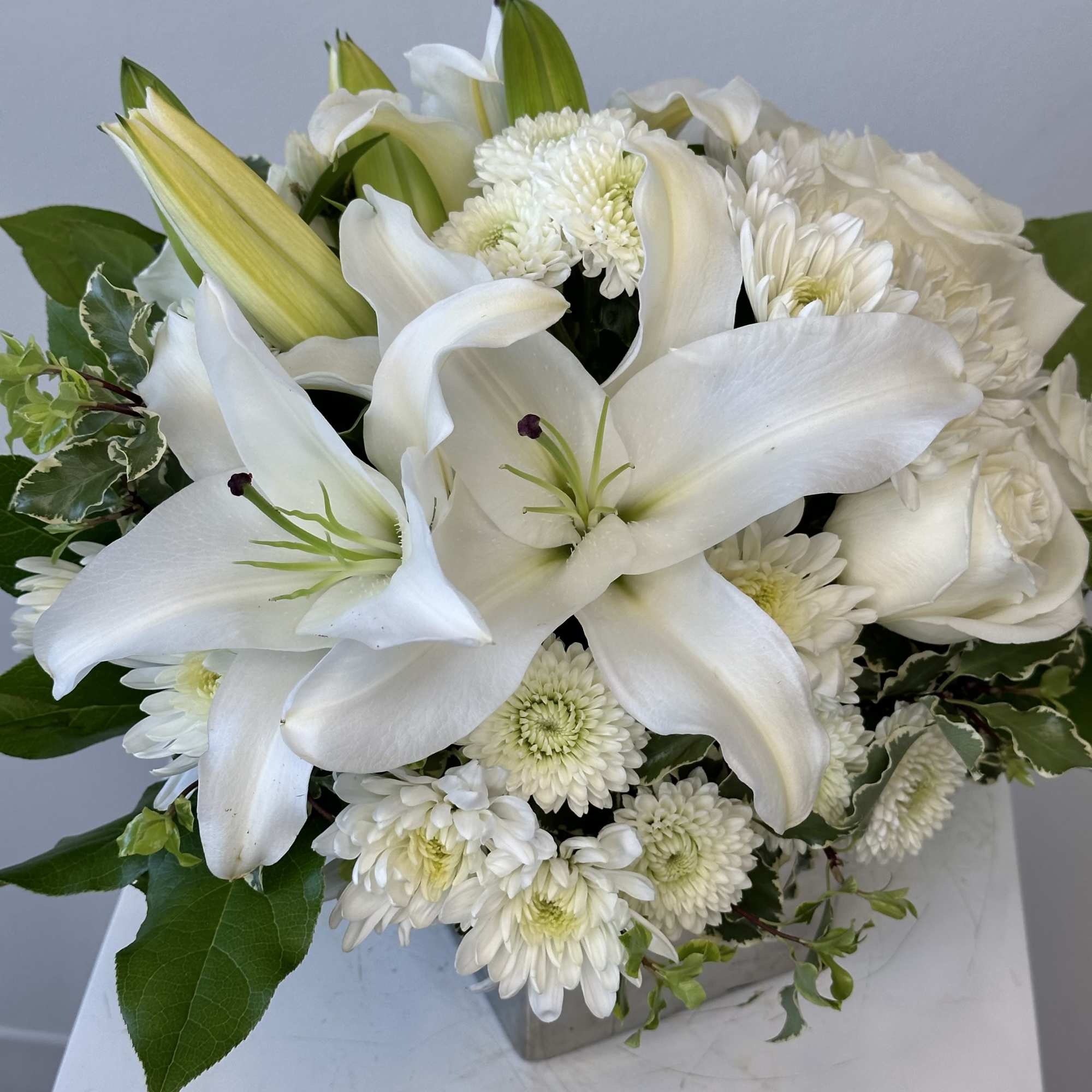 Celebrate serenity and heartfelt sentiment with the Peace and Joy Bouquet, a