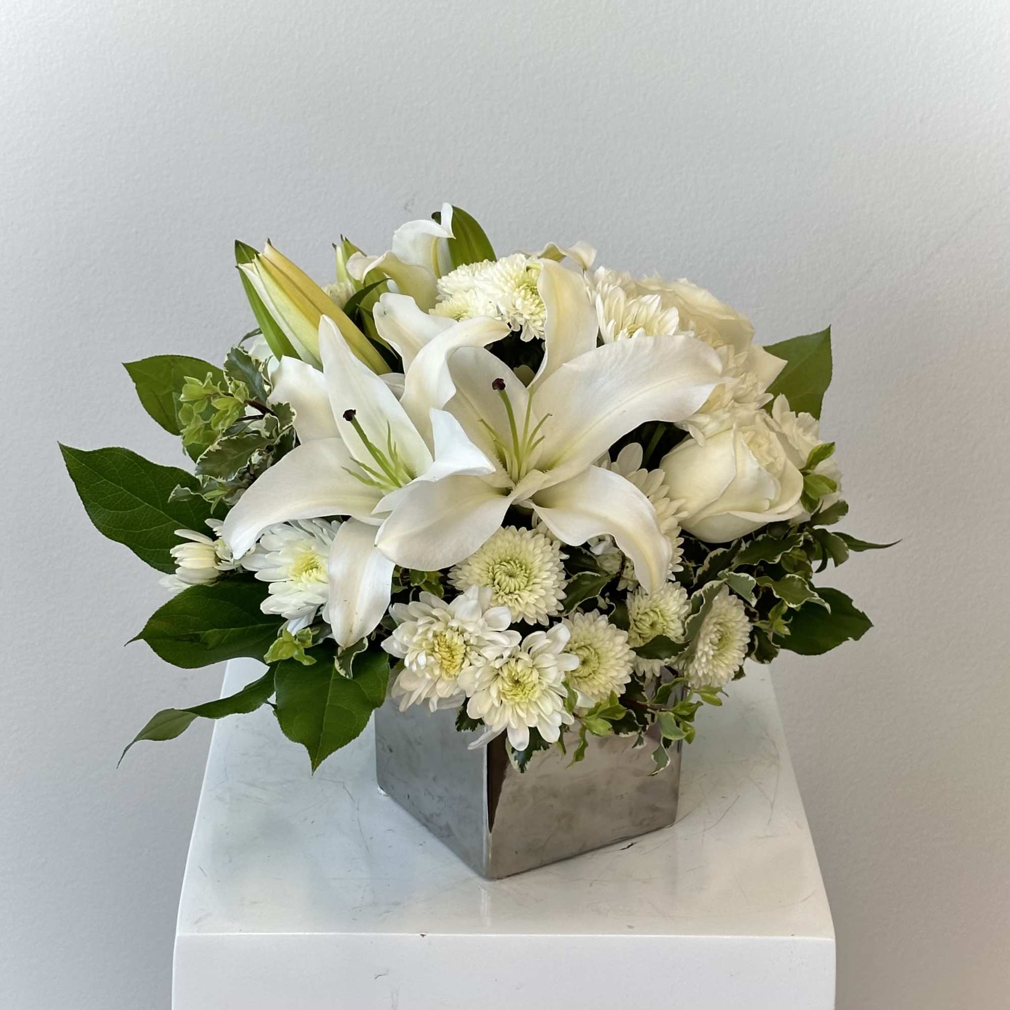 Celebrate serenity and heartfelt sentiment with the Peace and Joy Bouquet, a