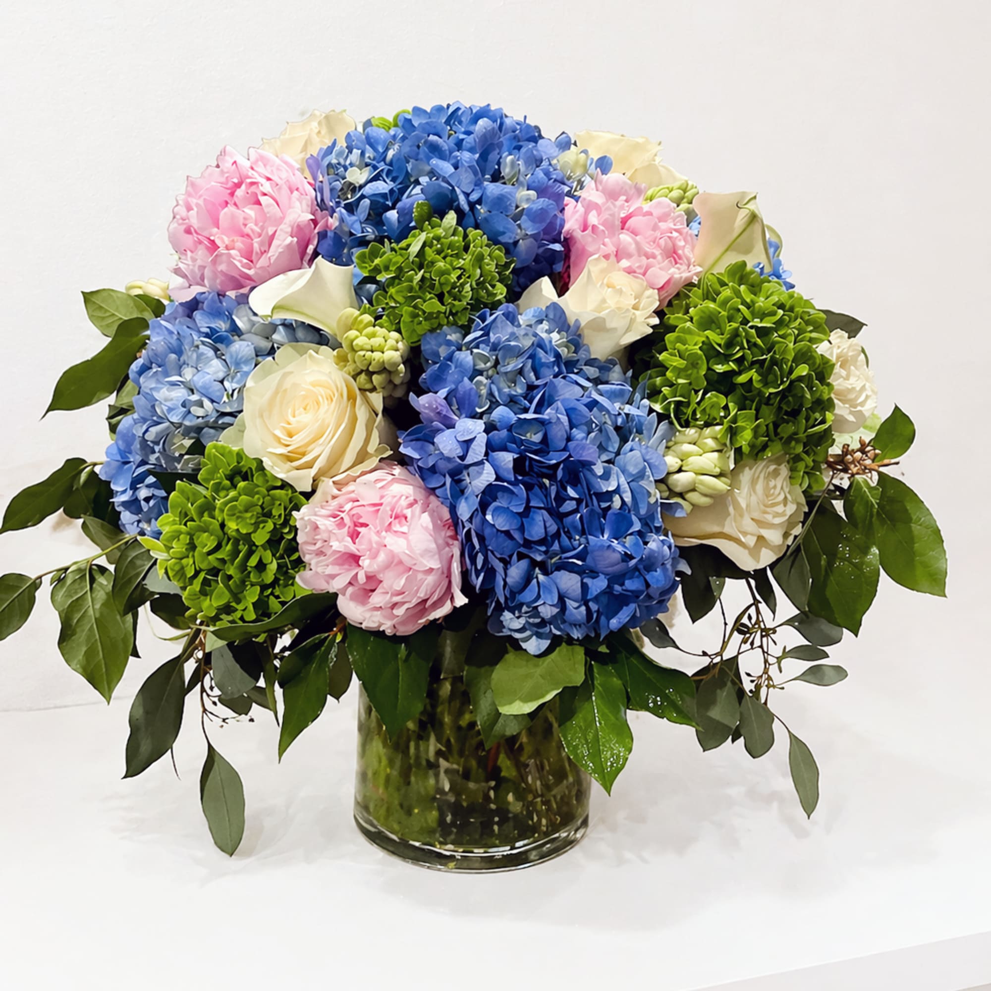 Celebrate her with something as graceful and nurturing as she is. Mom's