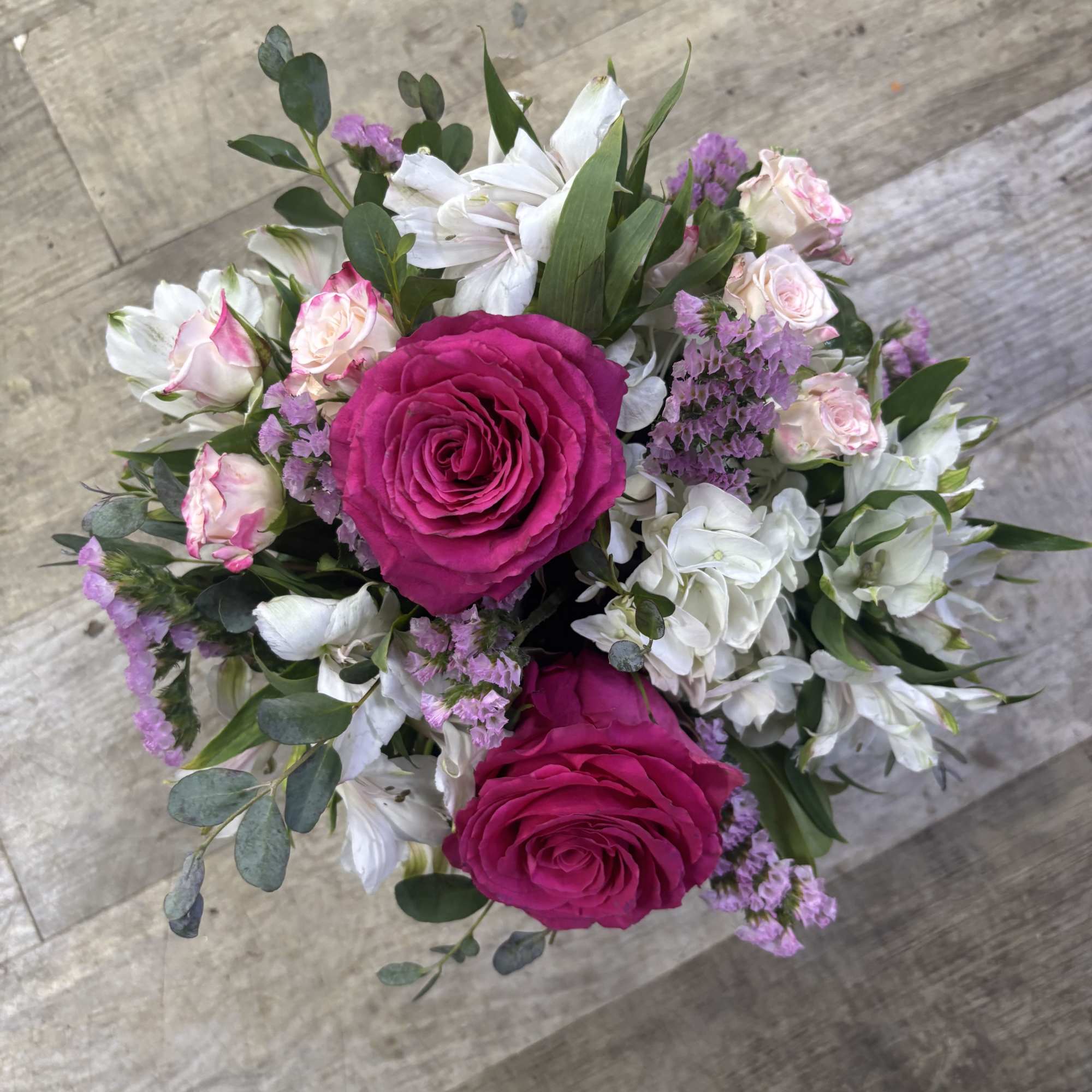 Kensington Gardens Standard is a romantic fresh flower arrangement inspired by elegant