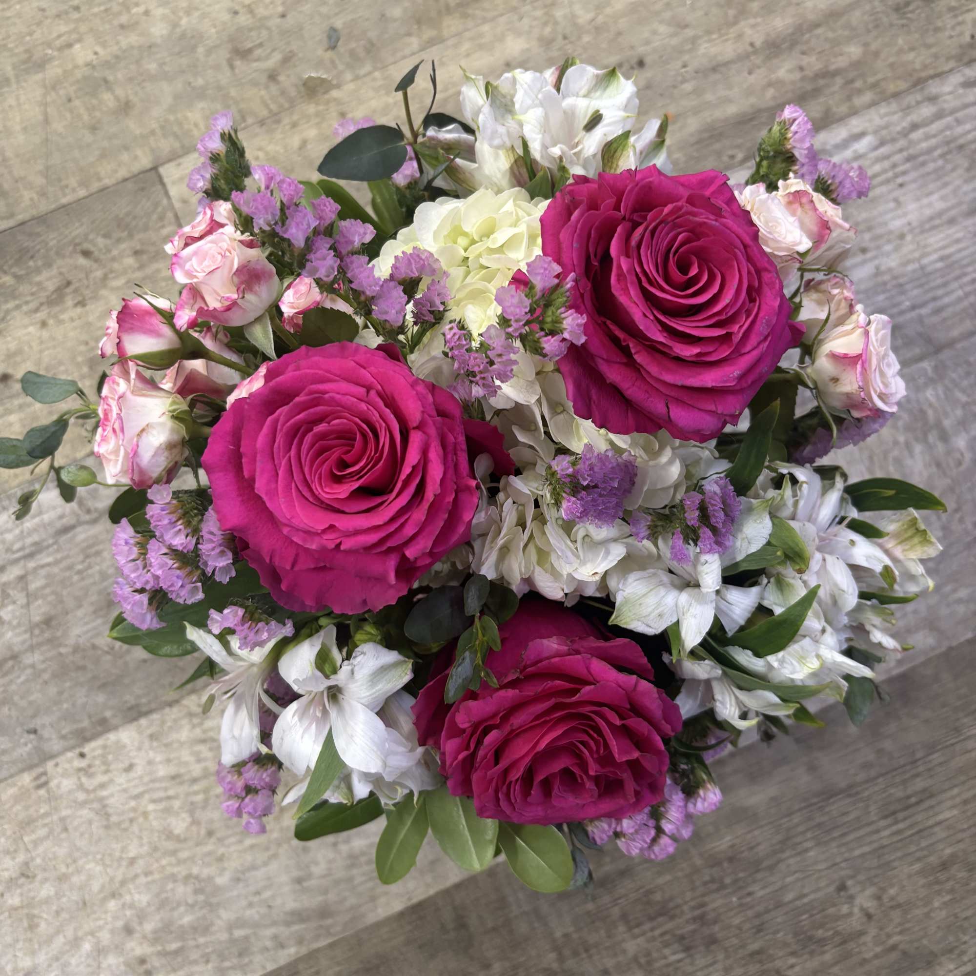 Kensington Gardens Standard is a romantic fresh flower arrangement inspired by elegant