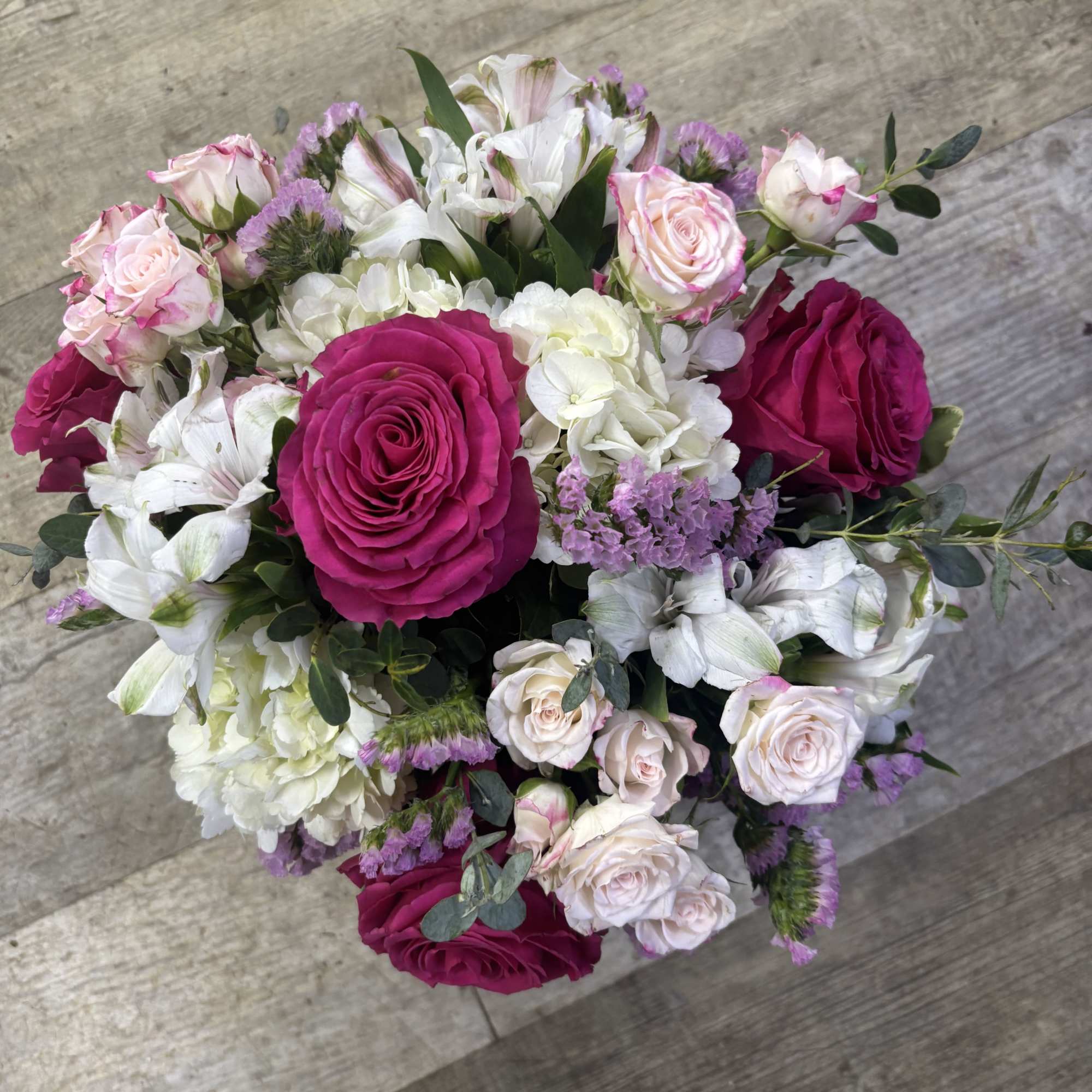 Kensington Gardens Standard is a romantic fresh flower arrangement inspired by elegant