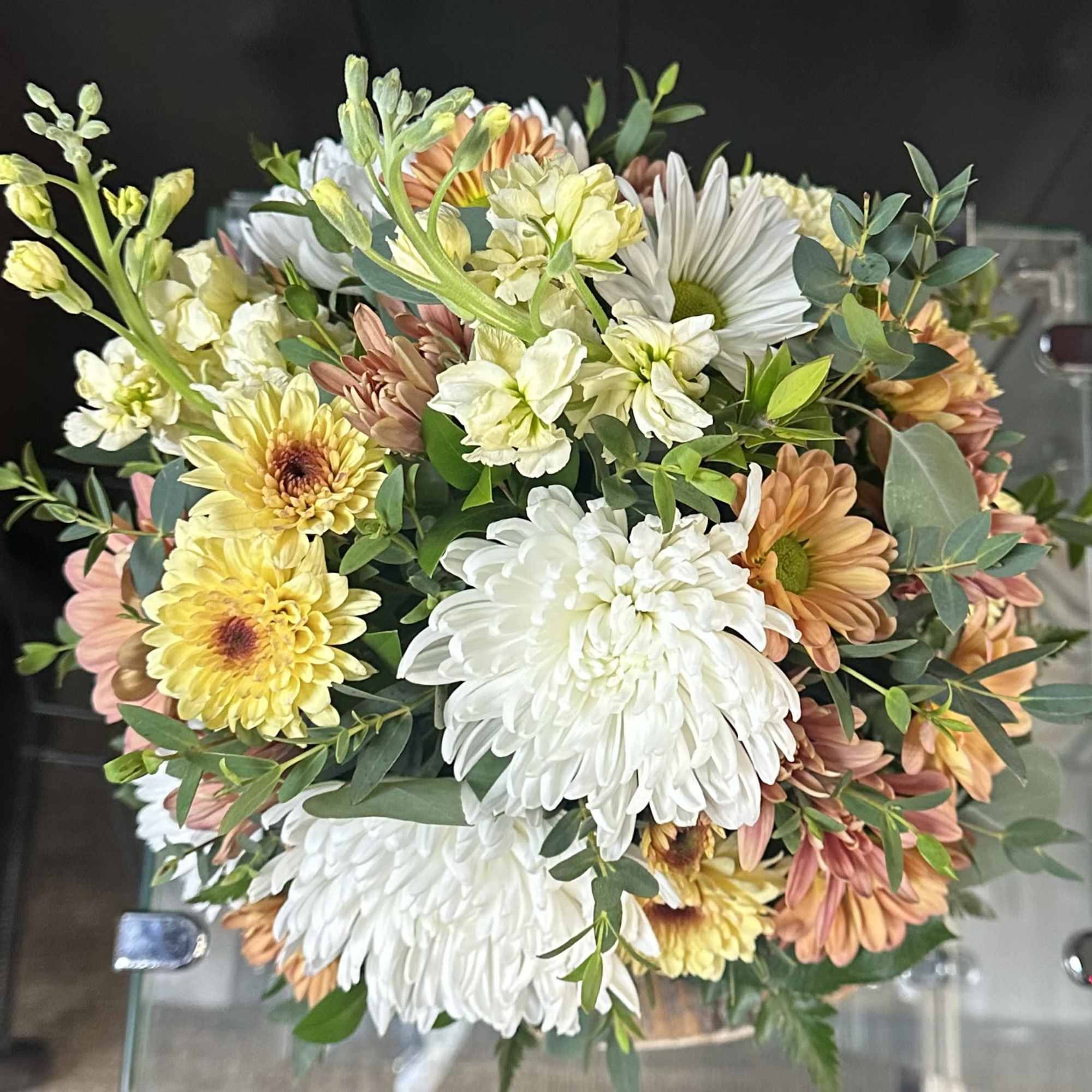 This beautiful bouquet includes classy, subtle colors that bring a sense of