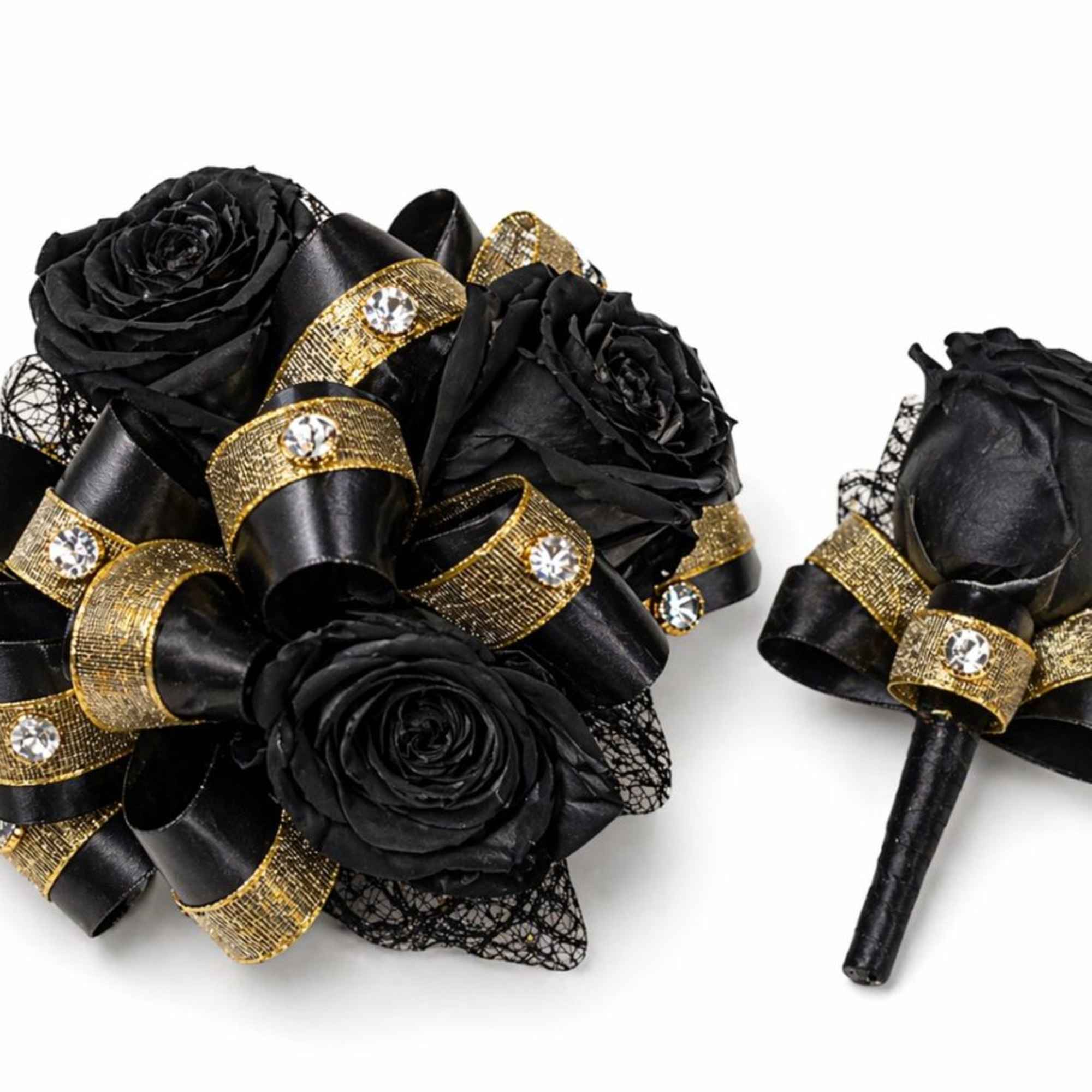 Three large black roses arranged as a bold wrist corsage make a