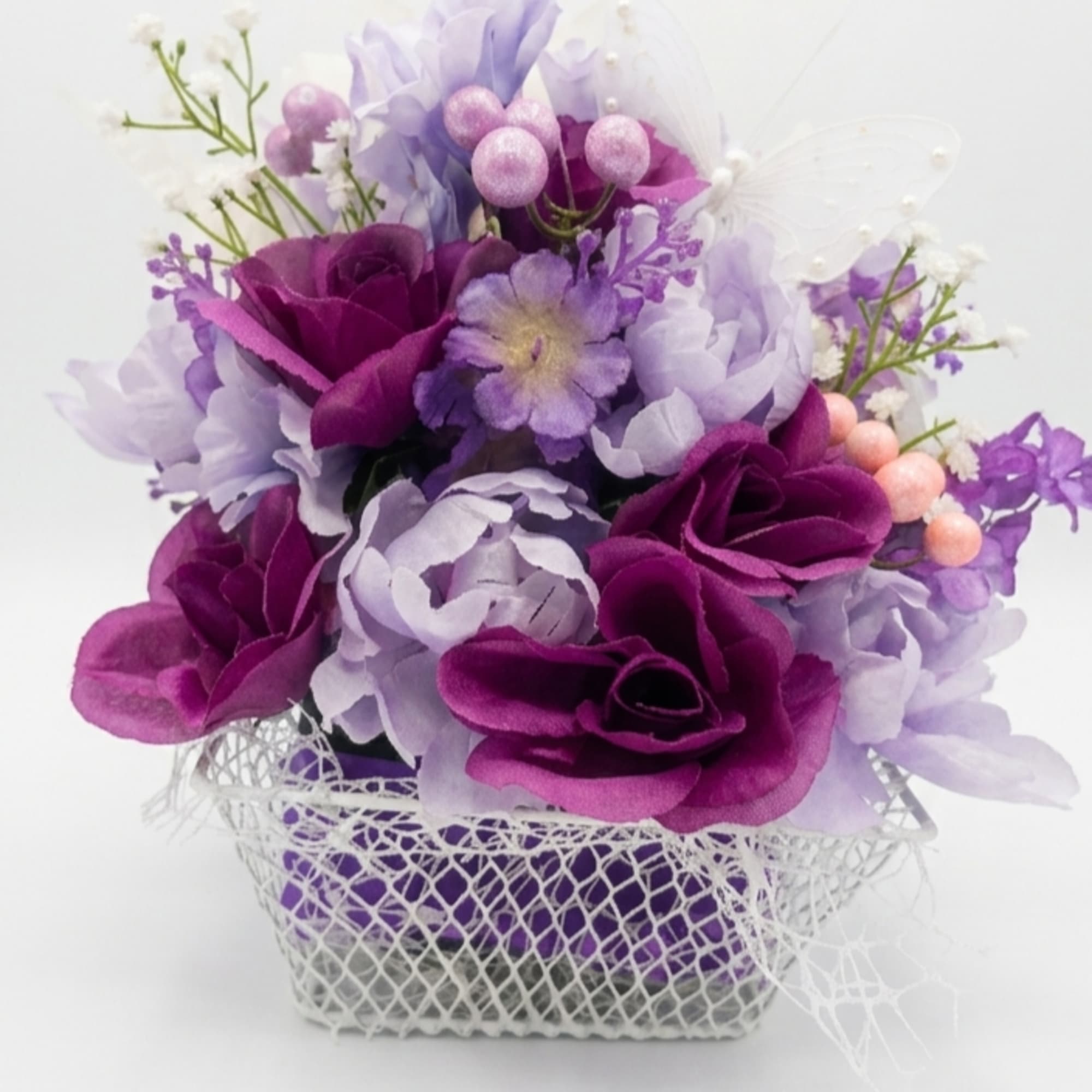 Soft satin-like roses and clustered blooms in purple, lavender, pink and white