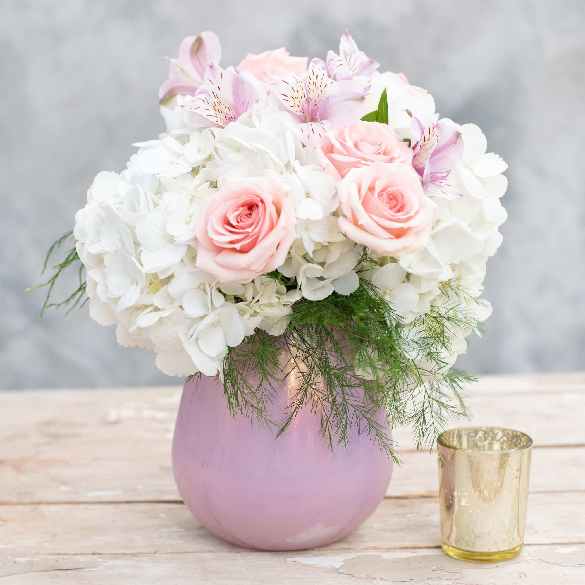 Surely Mom will love this delicate, sweet, pink, white and lavender arrangement
