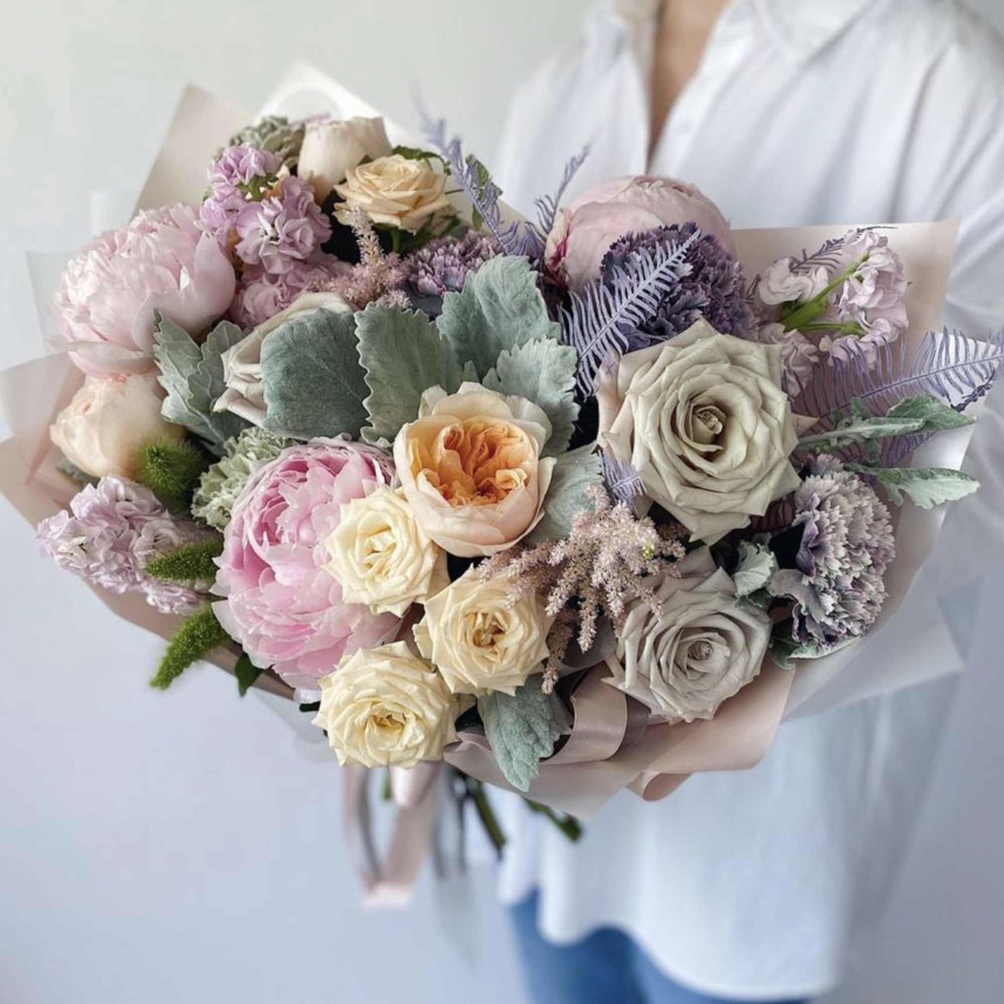 Stunning bouquet of Peonies, Garden Roses, and other mixed flowers.