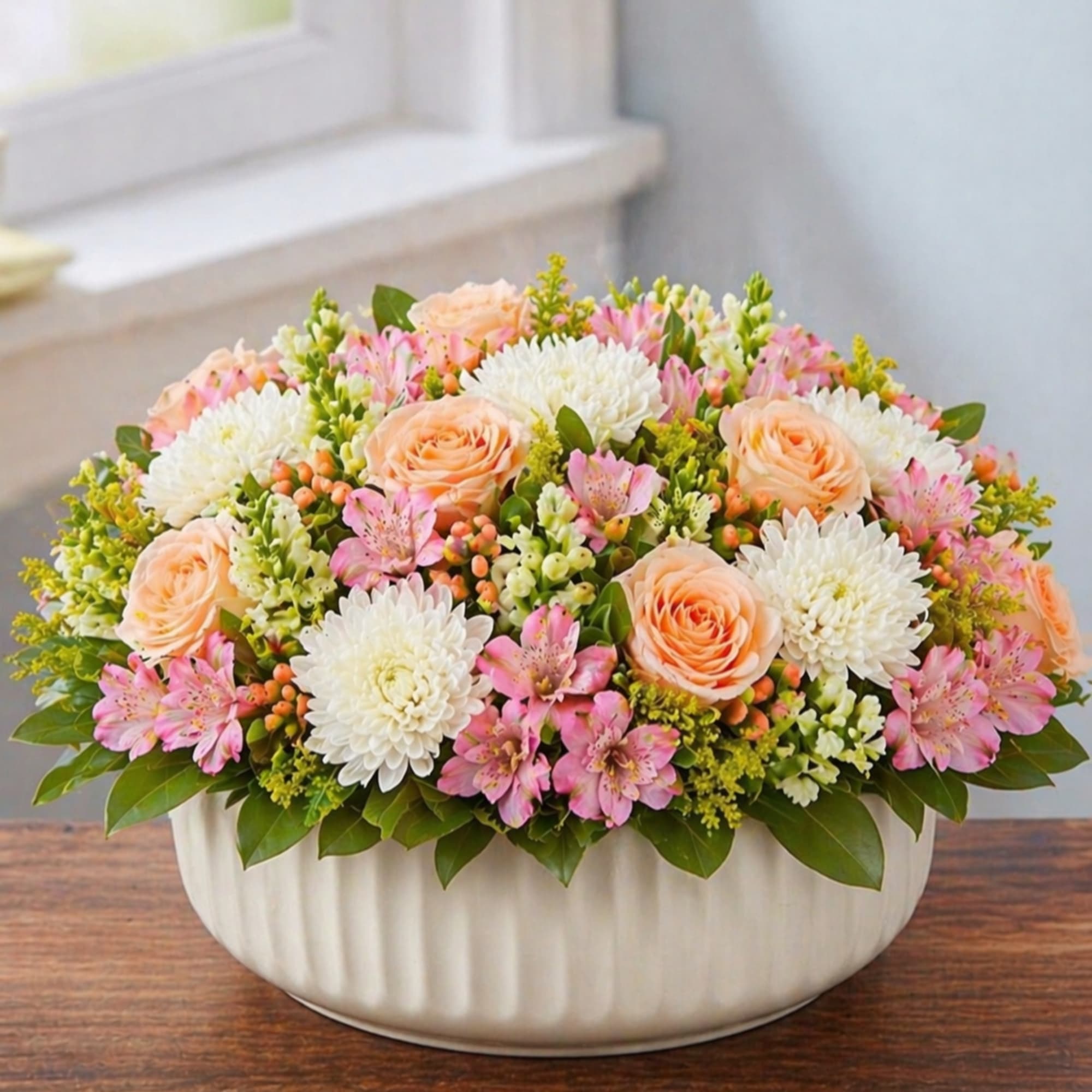 EXCLUSIVE An exquisite gift with garden-inspired style. Our blush-colored gathering of blooms