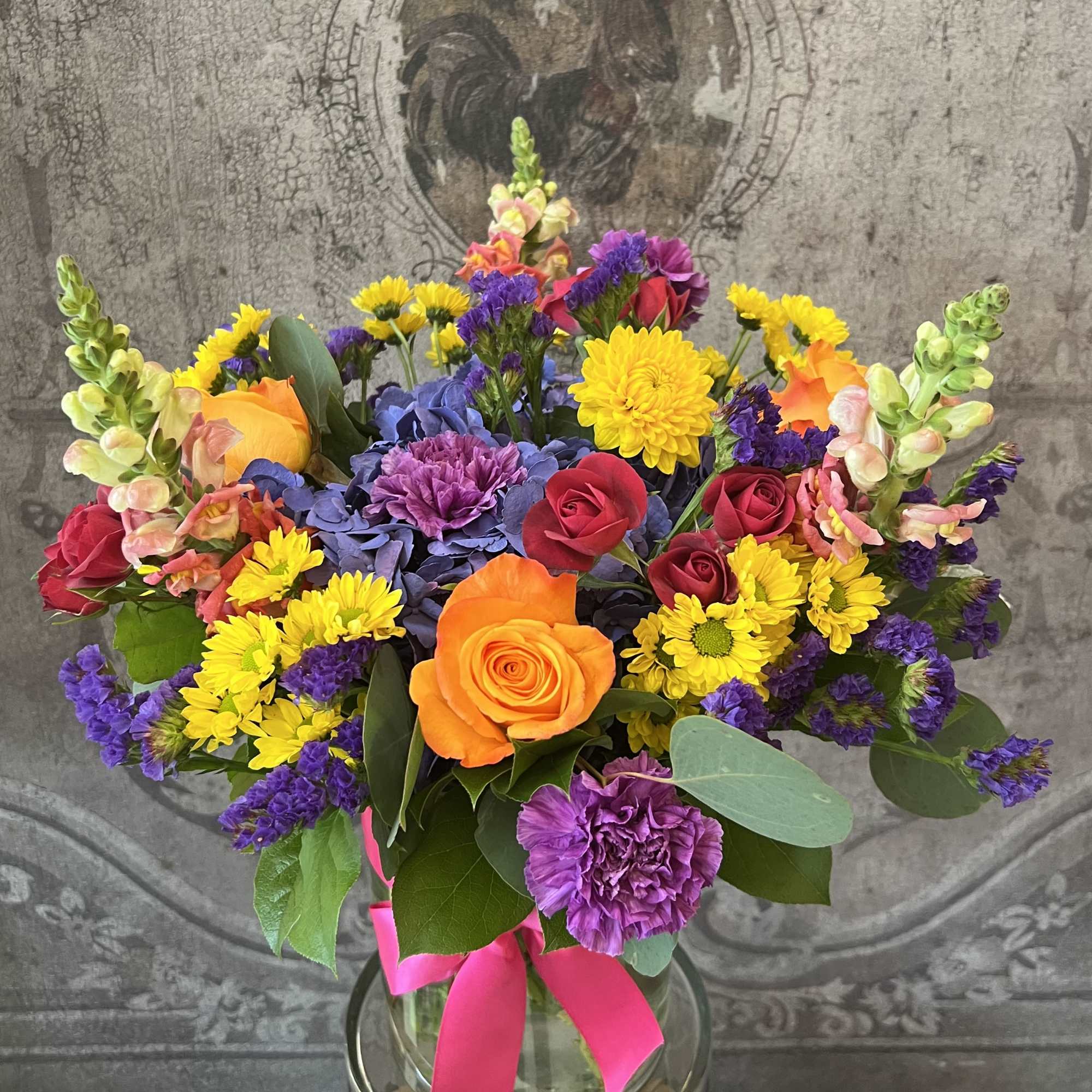 We created this arrangement with the Boldest and most Beautiful colors we