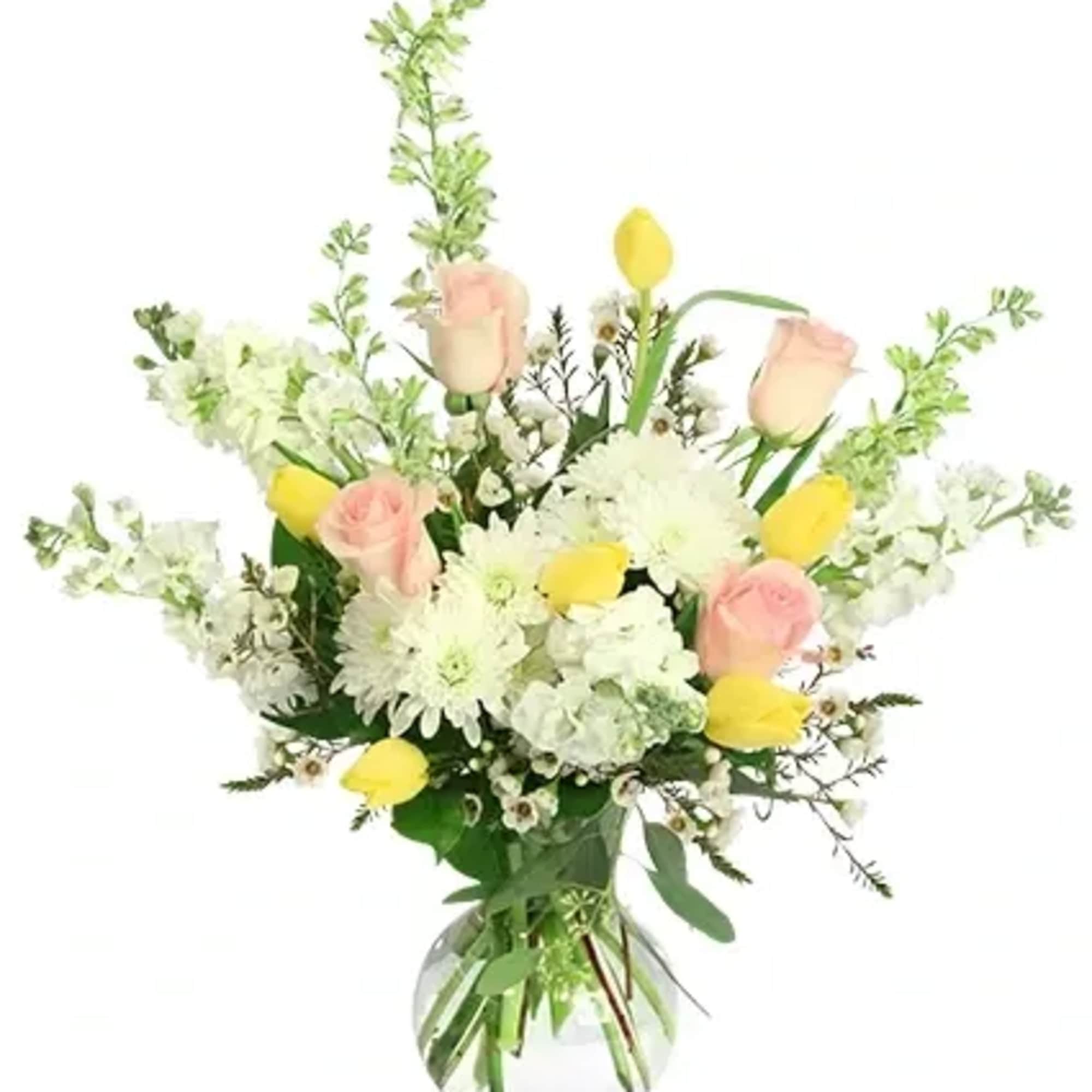 This stunning bouquet is a lush spring meadow arranged in a vase!