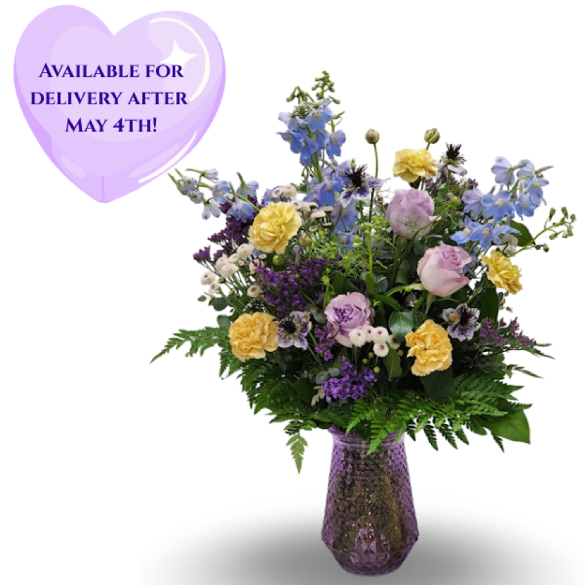A dreamy blend of soft and bold tones, this arrangement features elegant