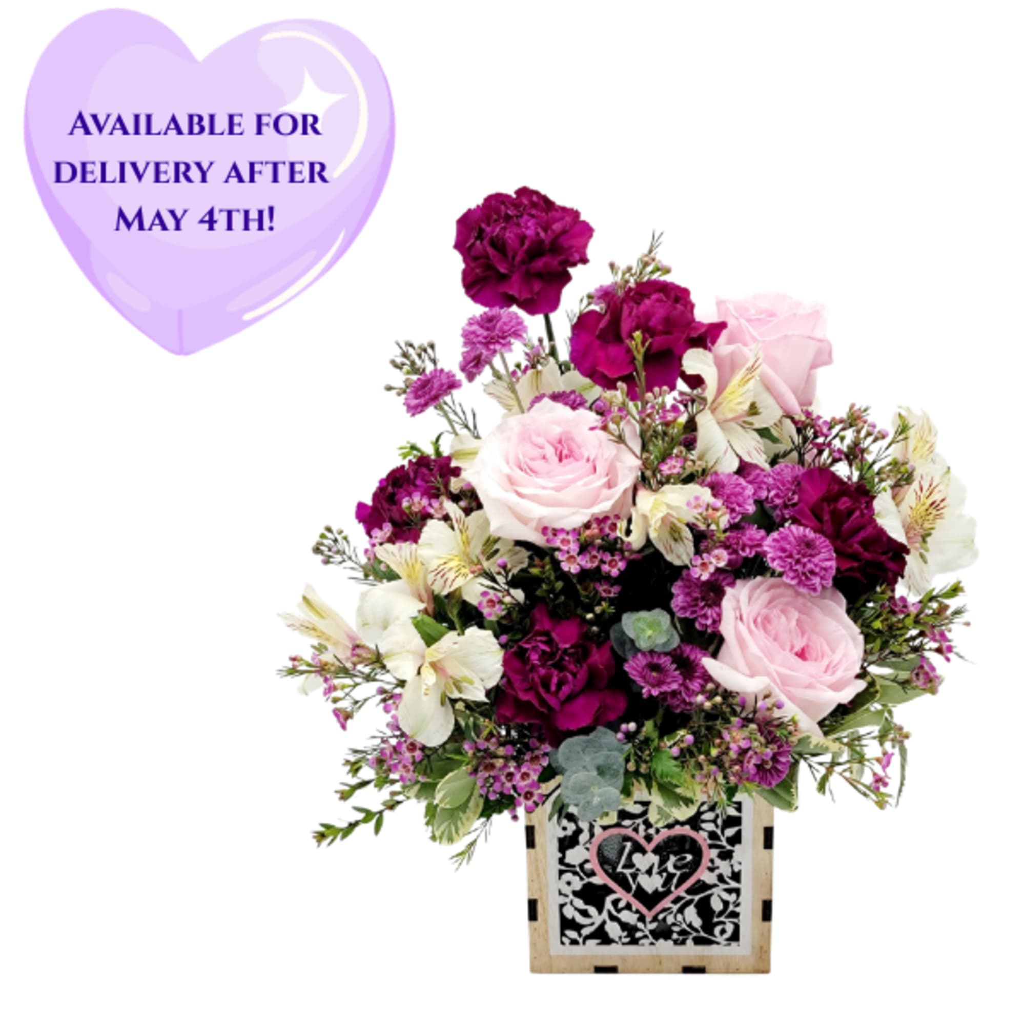 Select this sweet, pastel toned arrangement in a keepsake wooden box. 

Roughly