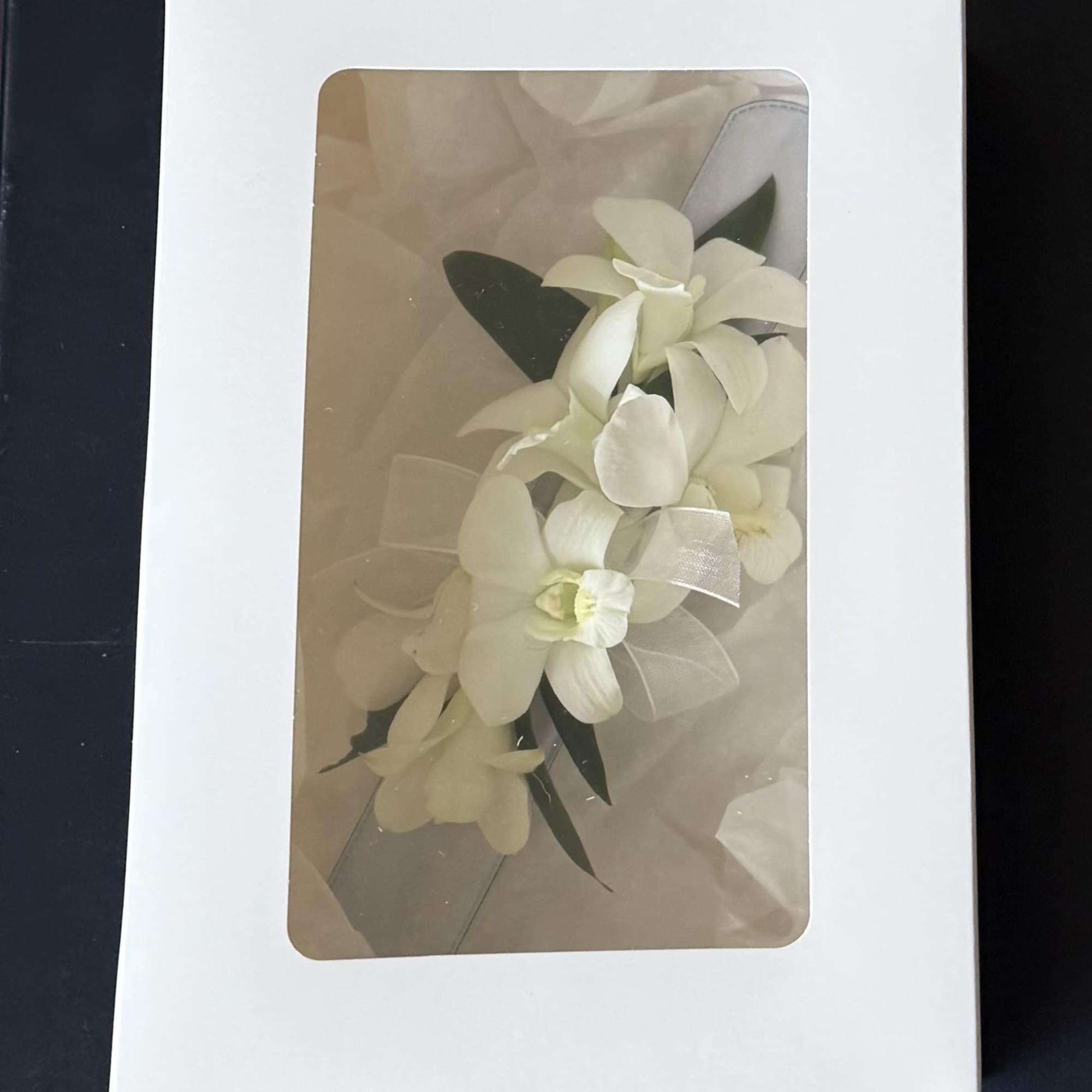 White dendrobium orchid corsage on snap on bracelet