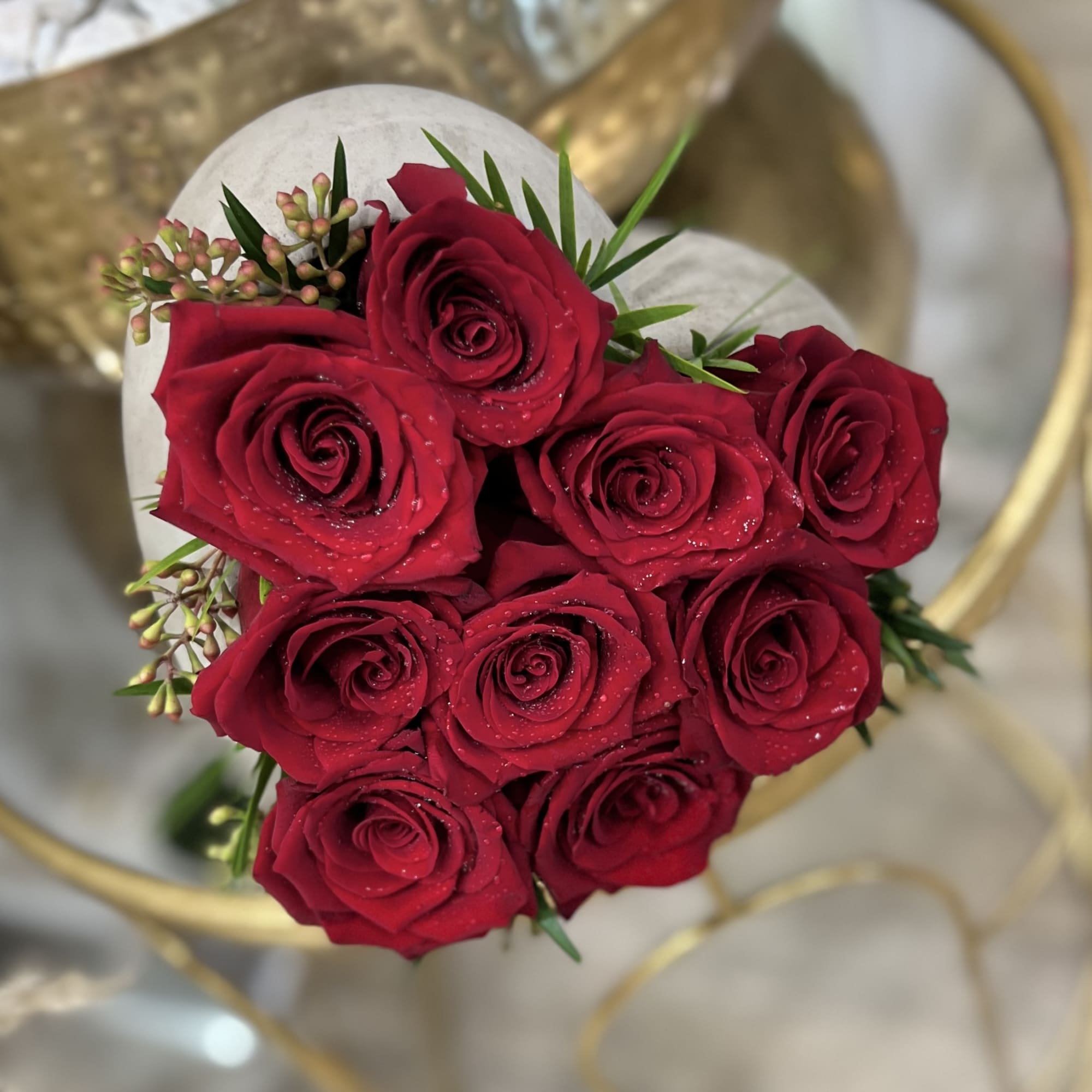 Bouquet of red roses with small filler flowers