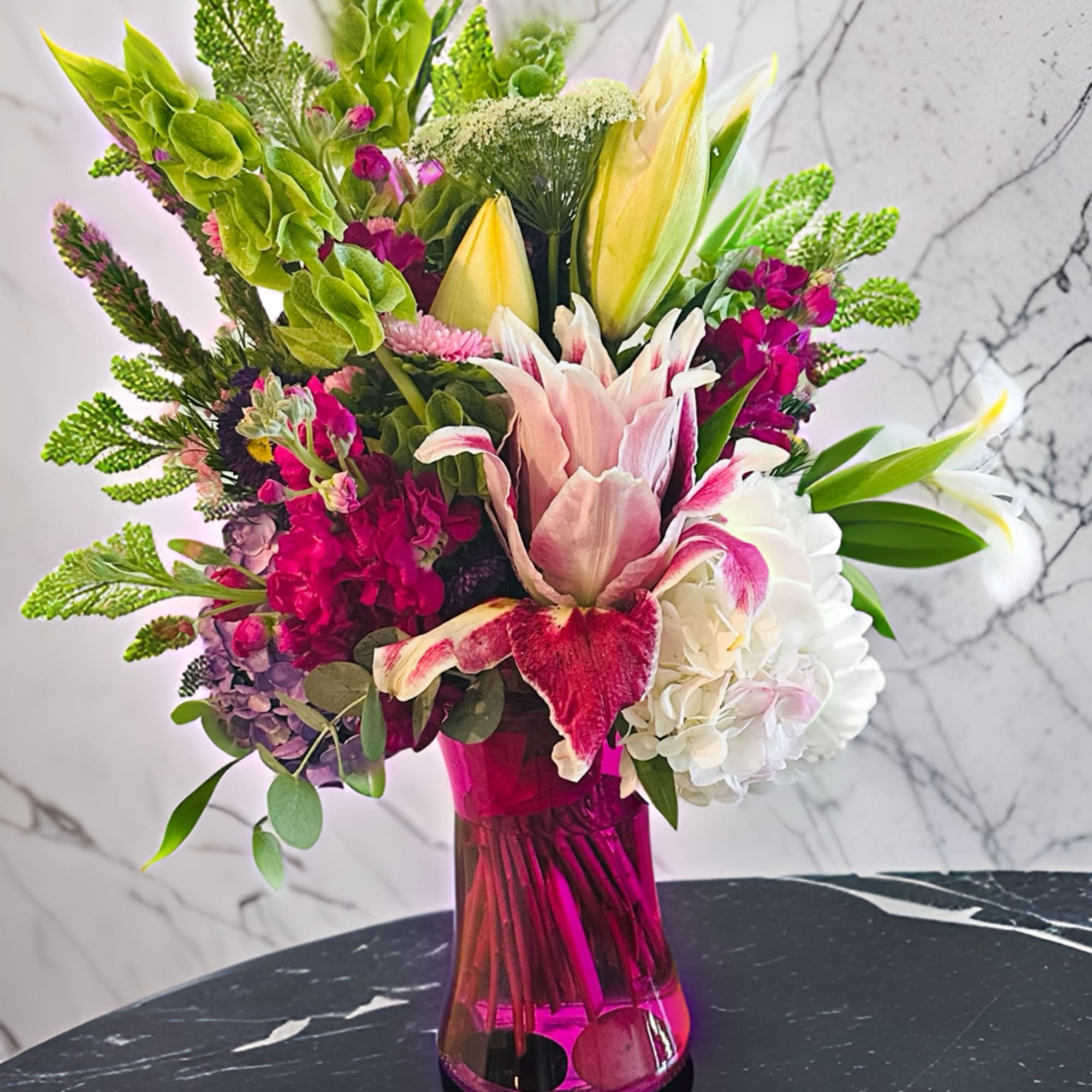 Our freshest collection of 'Stargazer' lilies, roses, luxe greenery and more. Simply