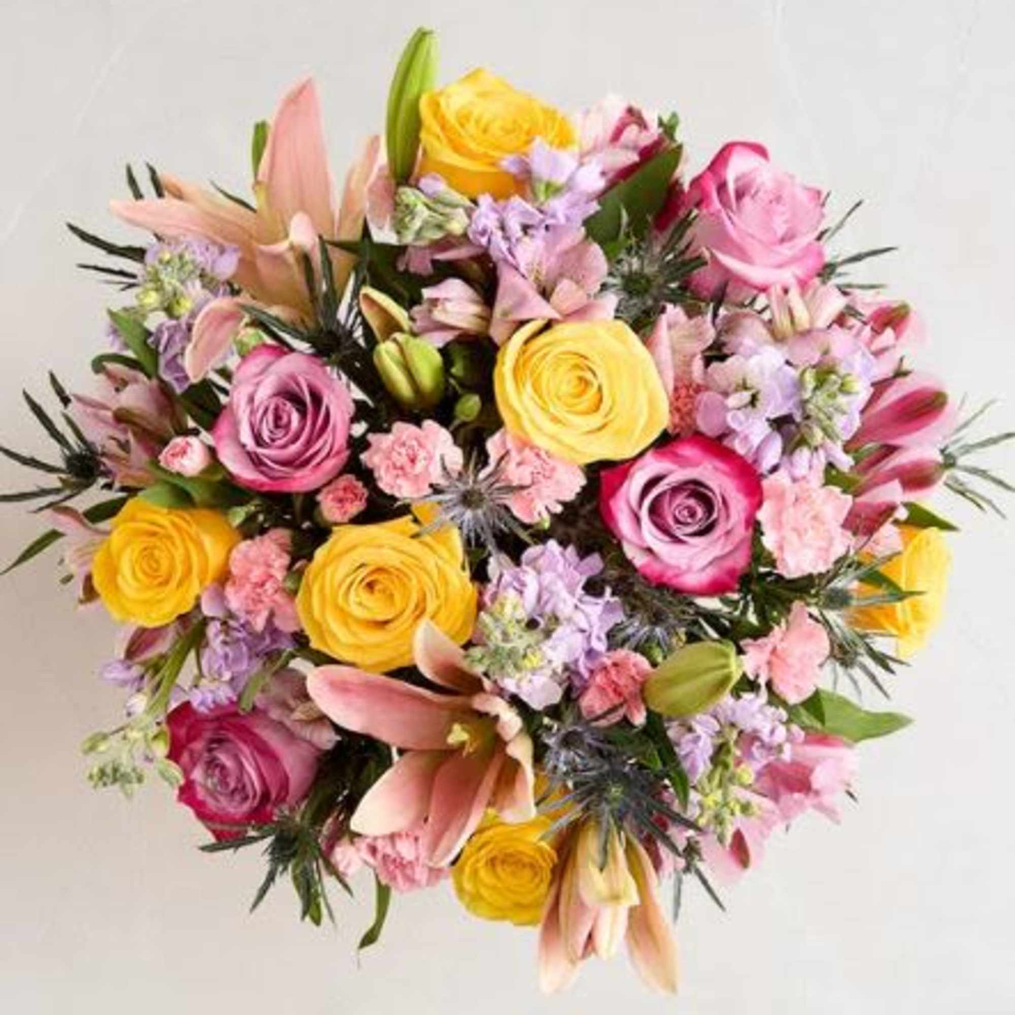  Pet Friendly?
No This arrangement contains Oriental Lilies, which are highly toxic