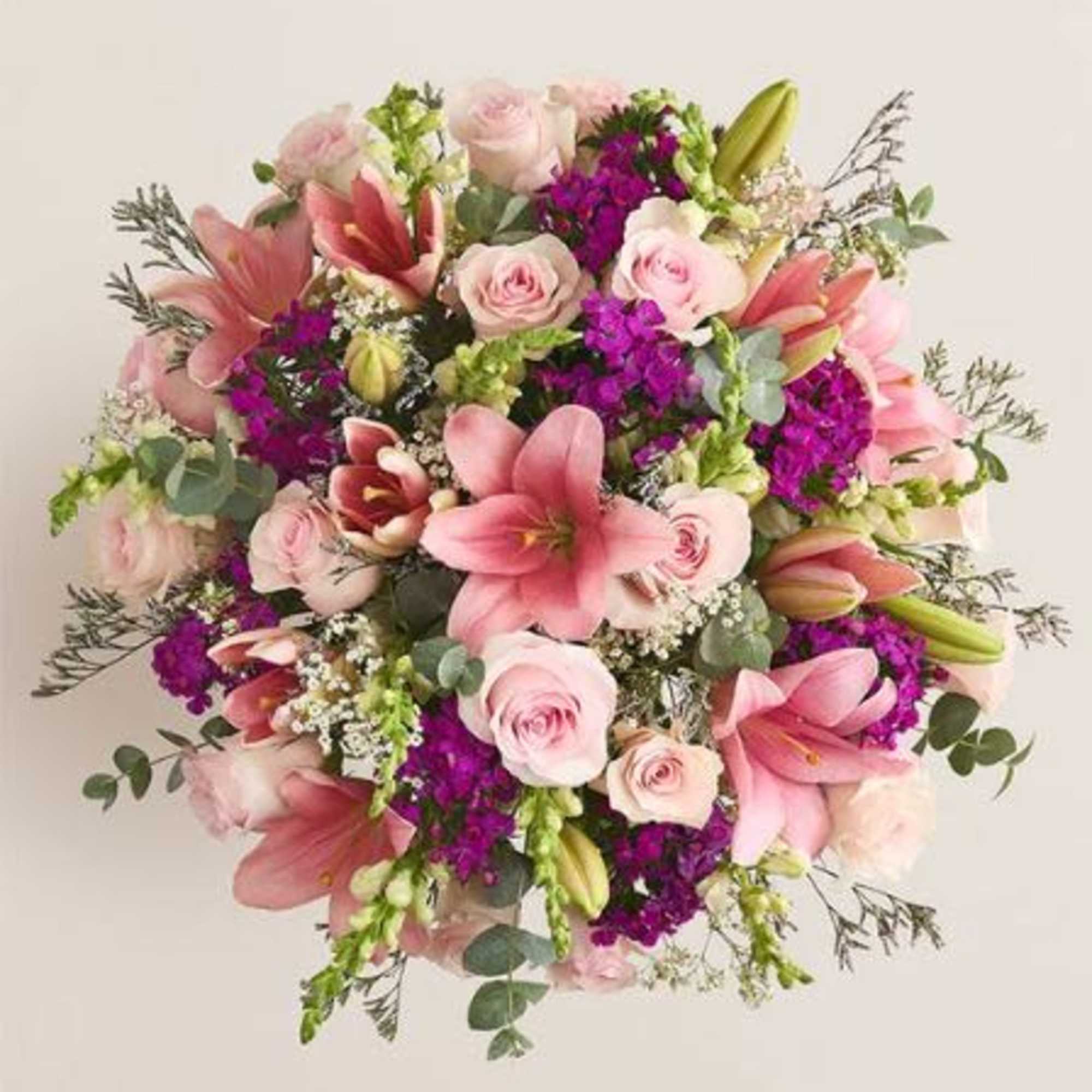  Pet Friendly?
No This arrangement contains Oriental Lilies, which are highly toxic
