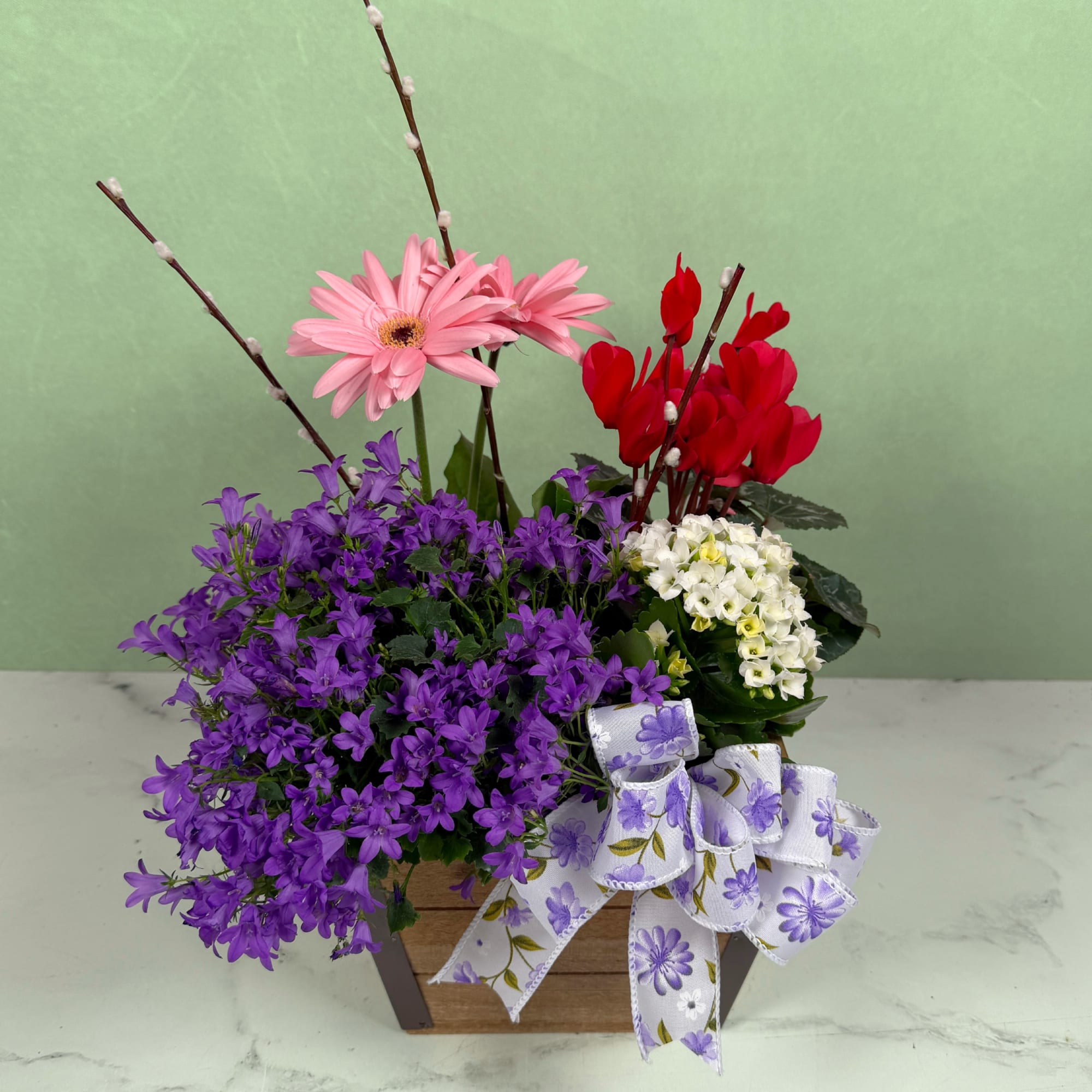 Our Flower Patch Paradise is a lively dish garden that bursts with