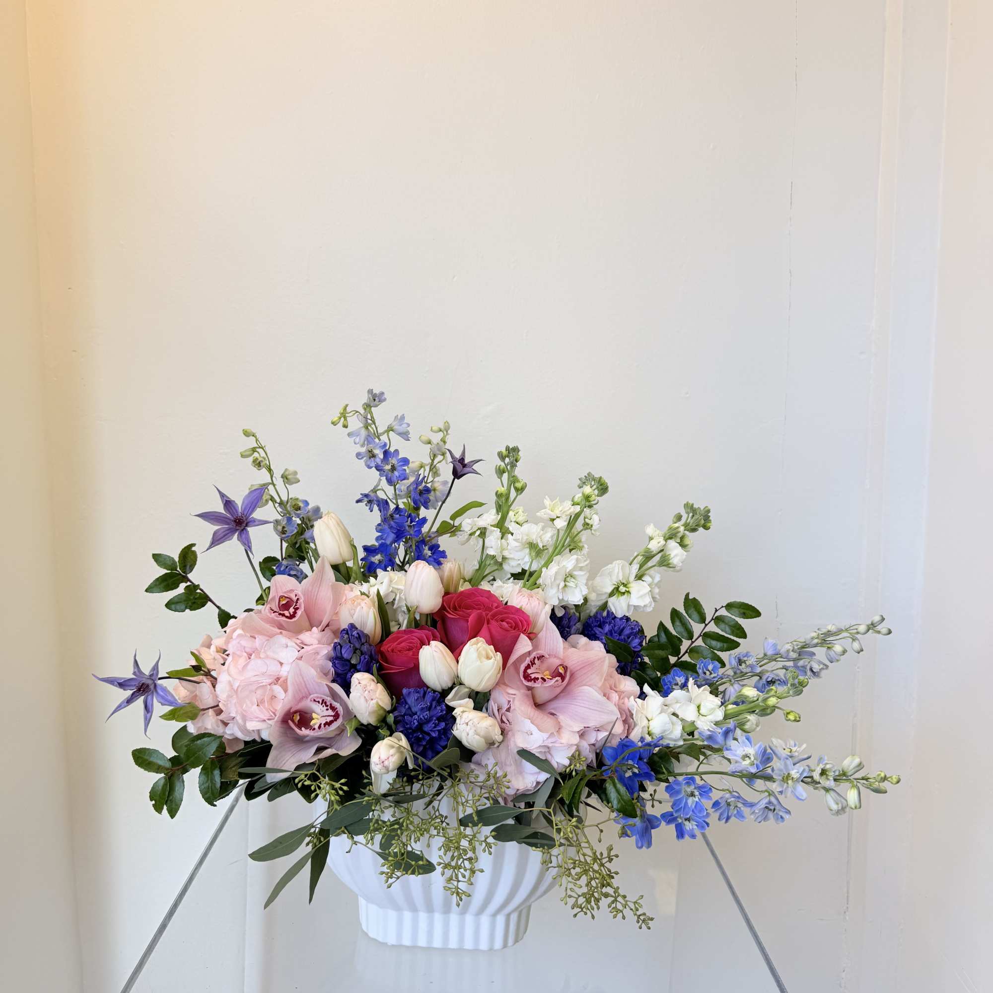 

A delicate harmony of blush pinks, soft whites, and vibrant touches of