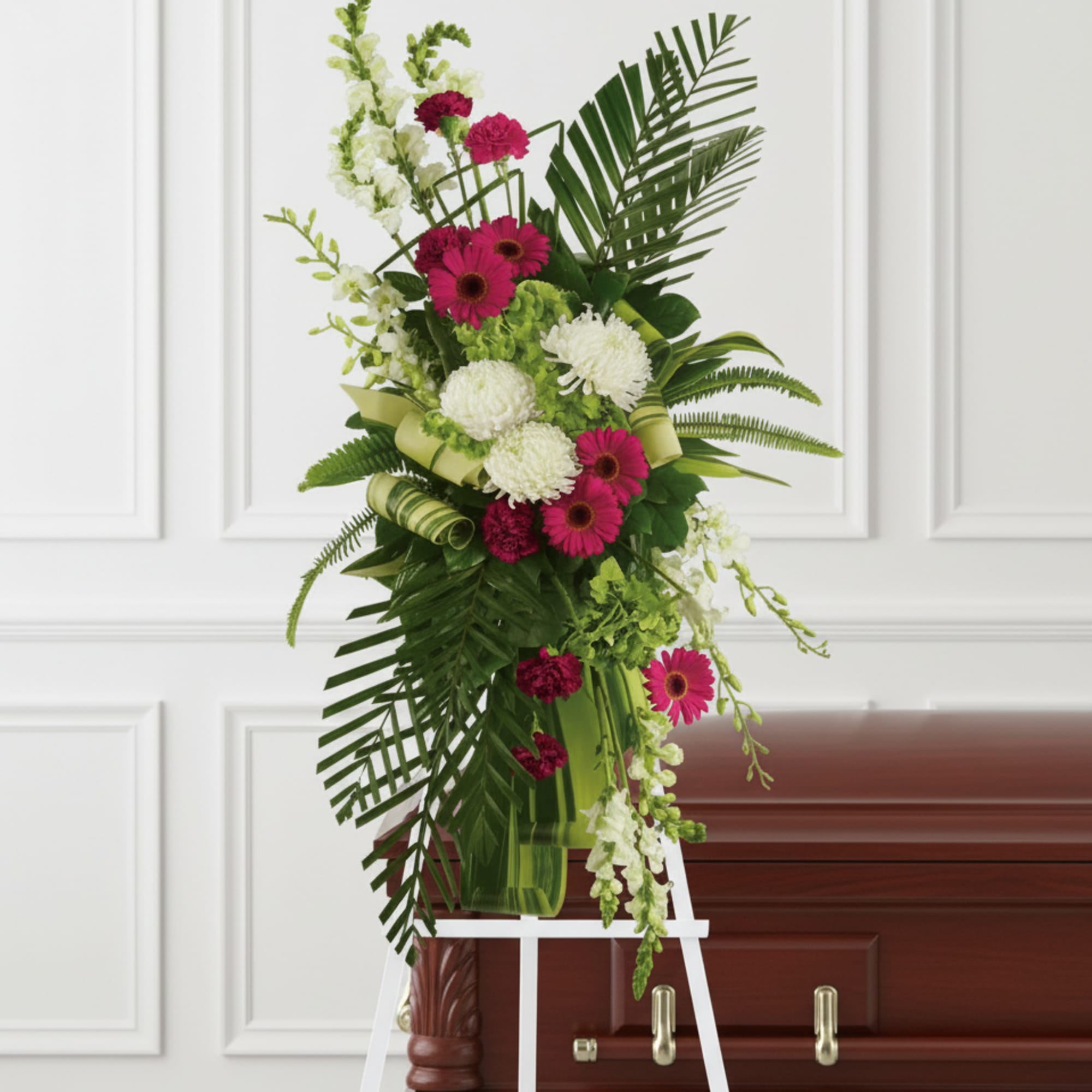 Convey your respect and admiration with this spray of striking red and