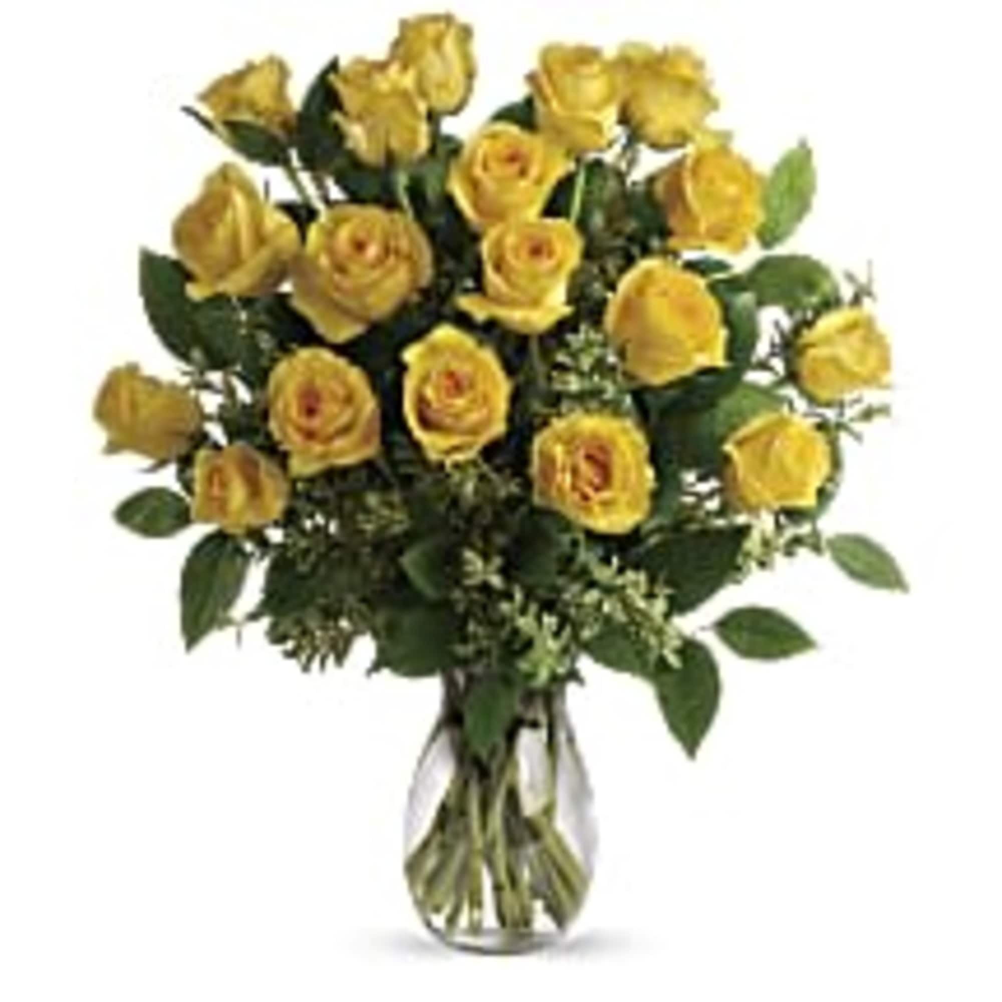 Bouquet of yellow roses in a clear glass vase