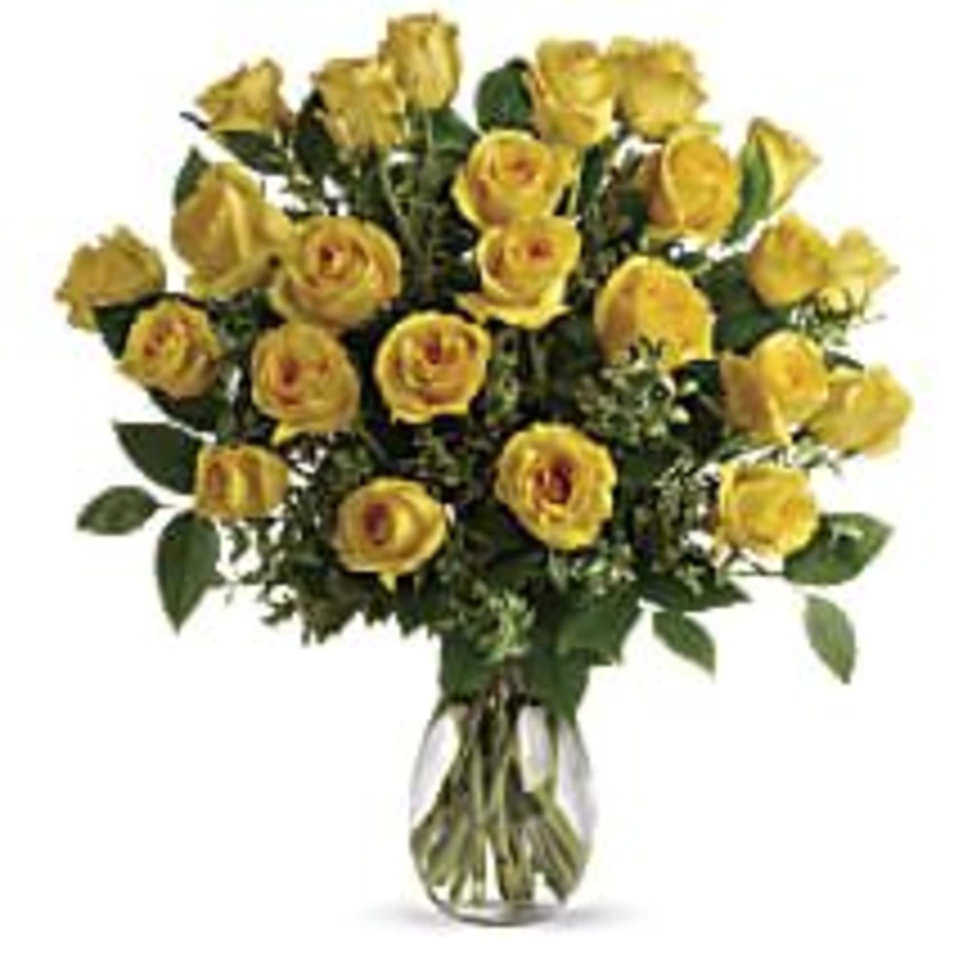 Bouquet of yellow roses in a clear glass vase
