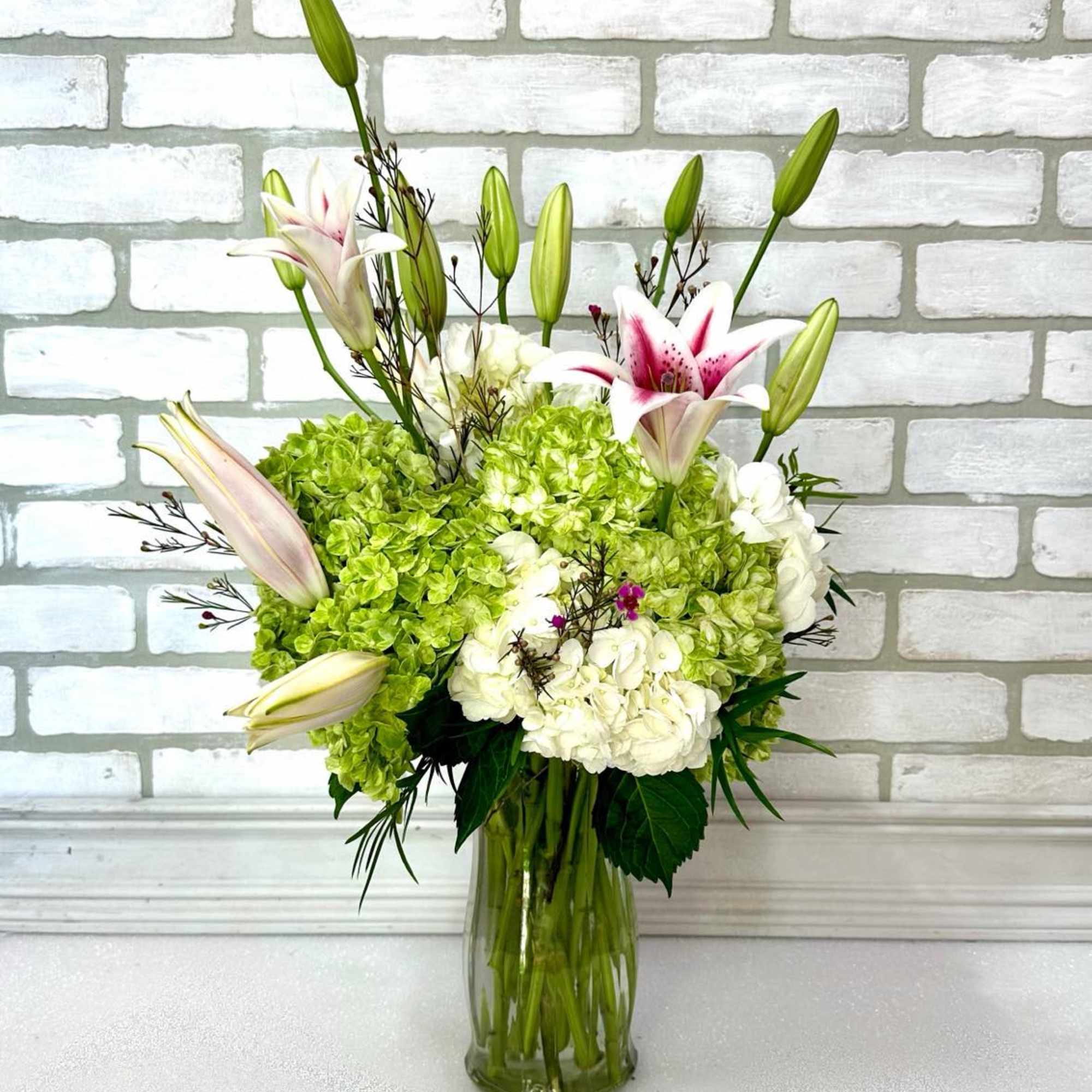 A gorgeous display of hydrangeas and stargazer lilies. 