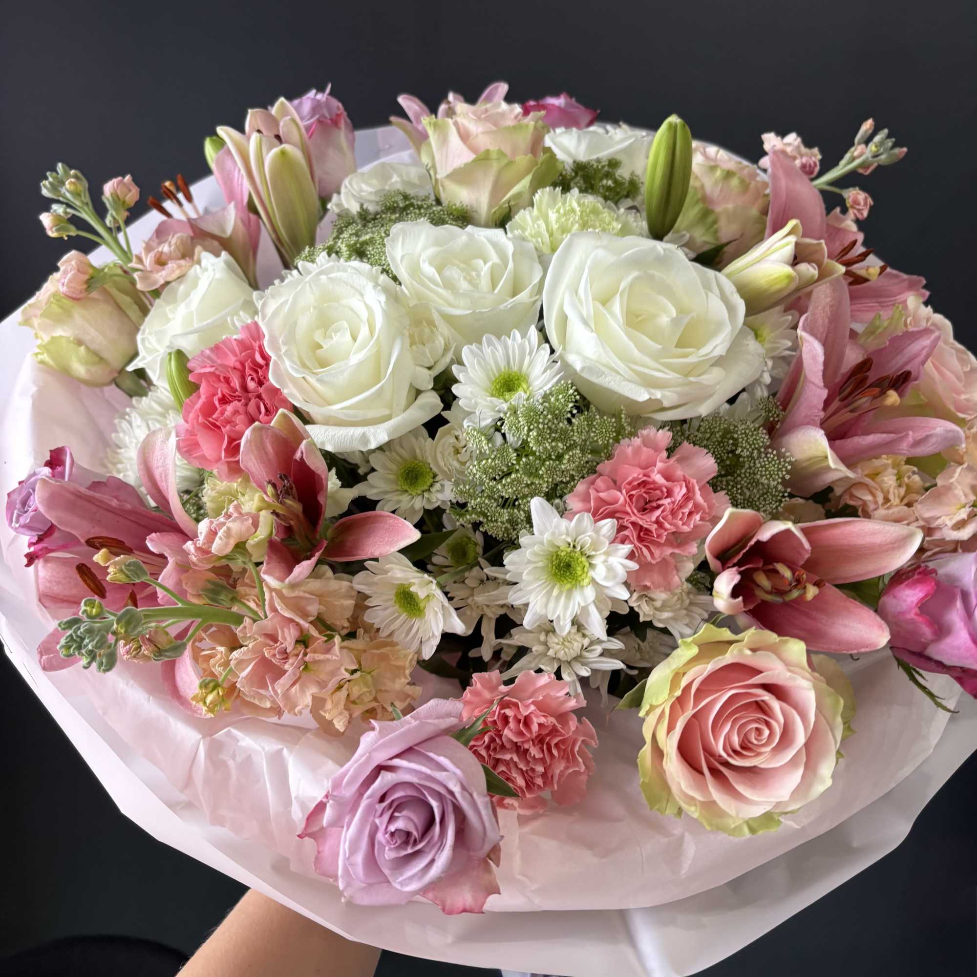 Blush Whisper Elegance is a voluminous, delicately balanced arrangement in shades of