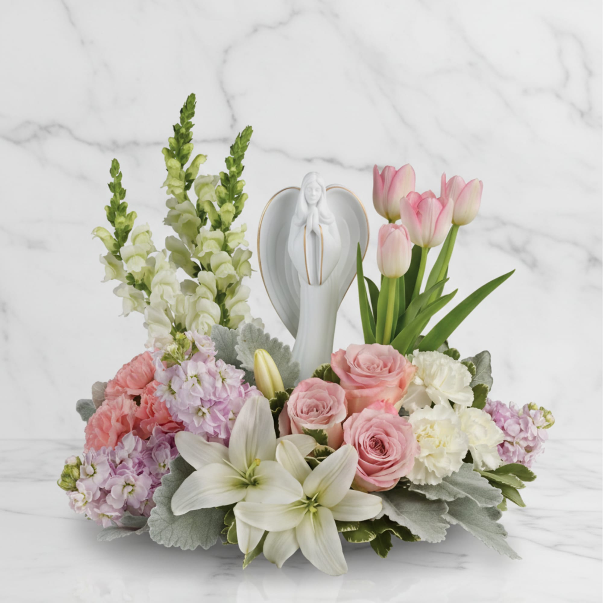 Show them you care with this gorgeous display of roses, lilies and