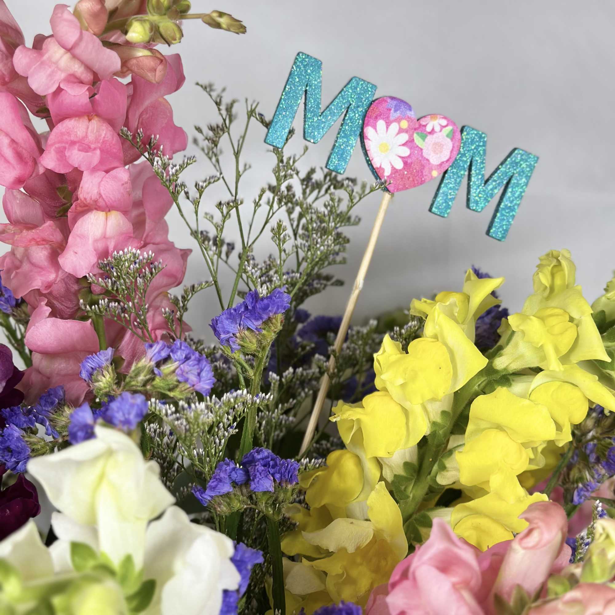 What a perfect Mother's Day arrangement! Tall beautiful Snapdragons in a variety