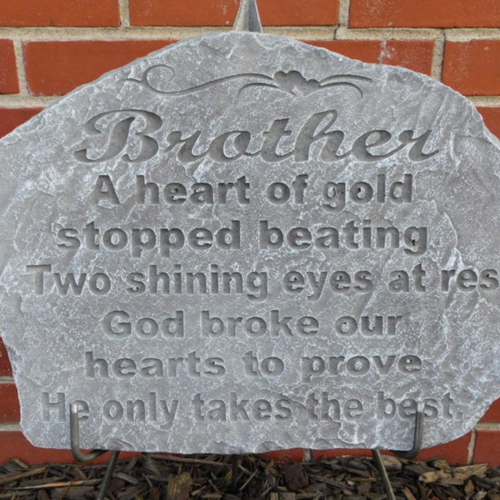 Engraved memorial stone with the word Brother and a poem