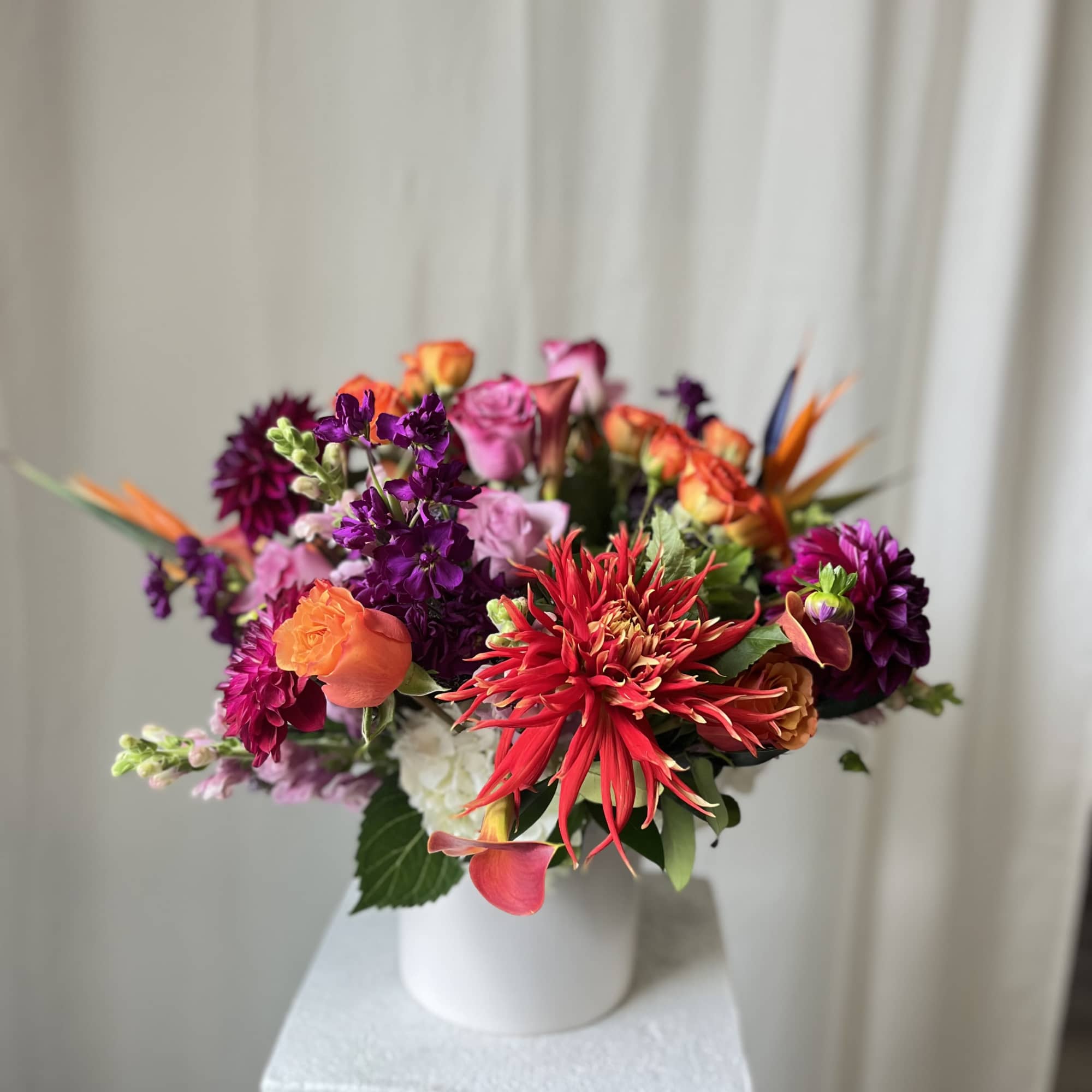 Brighten up the mood with this beautiful arrangement. Medium sized with a