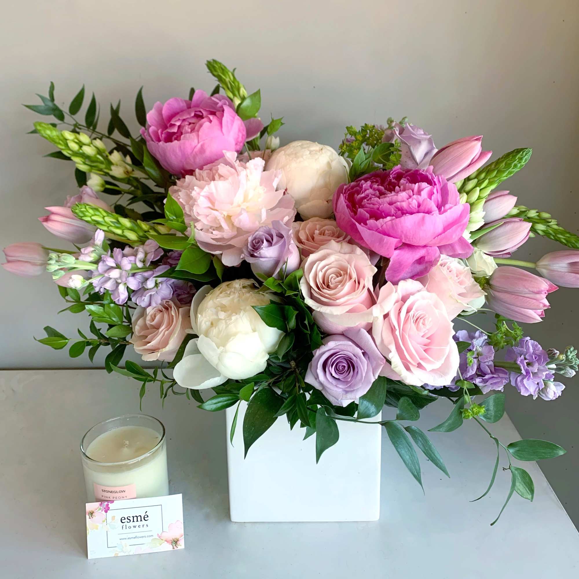 An assortment of Dutch peonies with ocean song and pink mondial roses