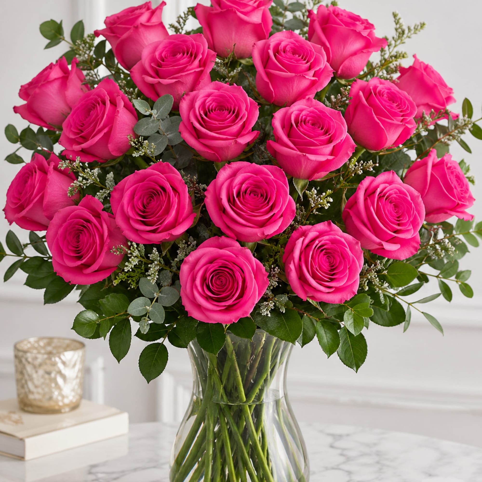 Hot love pink roses 12/18/24 in a vase, arranged with delicate greens