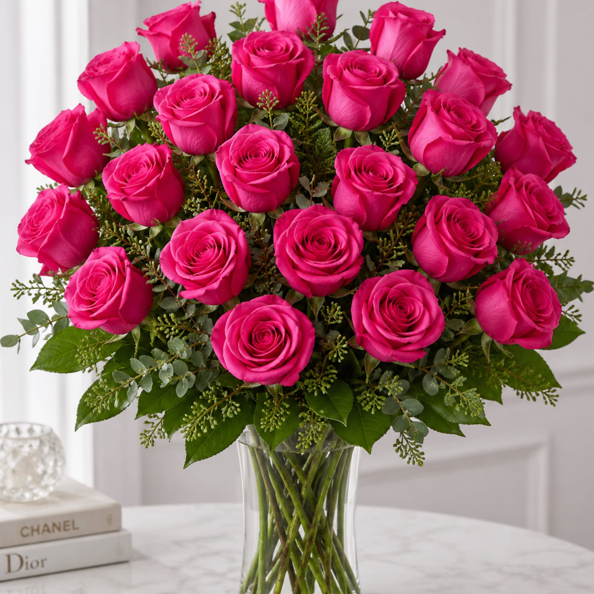 Hot love pink roses 12/18/24 in a vase, arranged with delicate greens