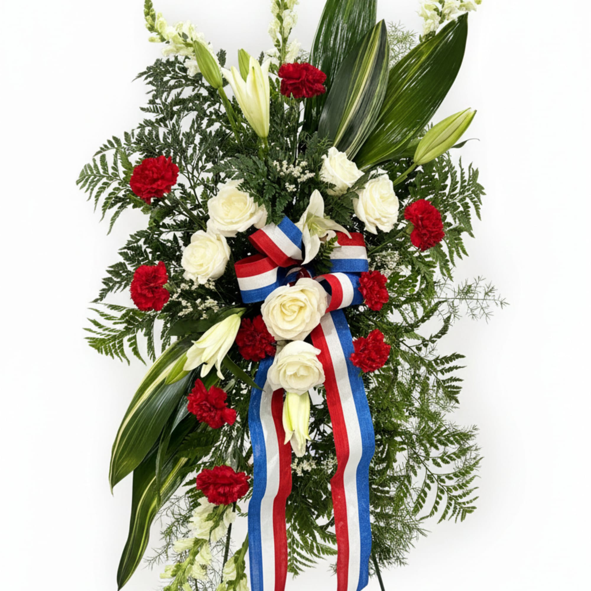 A tall, formal standing spray that reads with solemn dignity-perfect as a