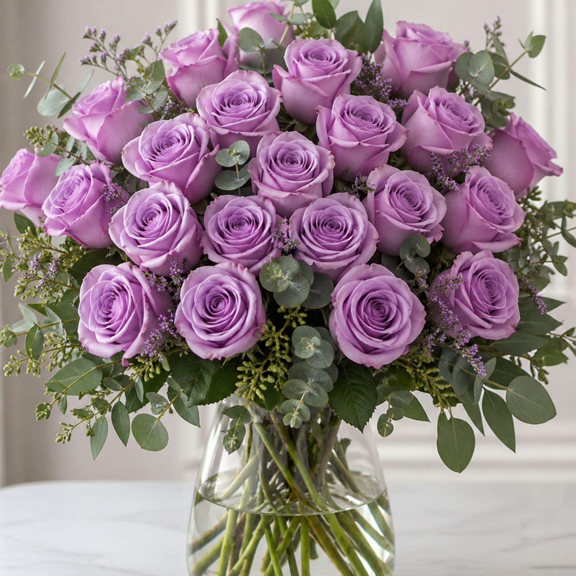 An enchanting bouquet of lavender roses sweetly touches her heart. Paired with
